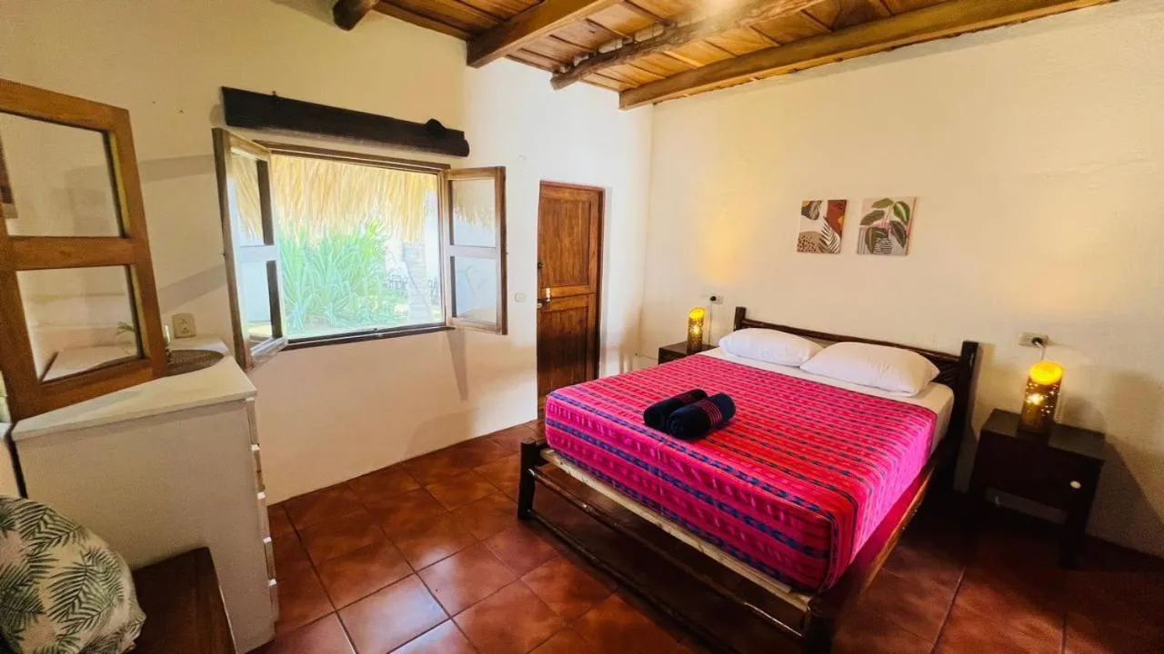 Bed in Paredon Surf House