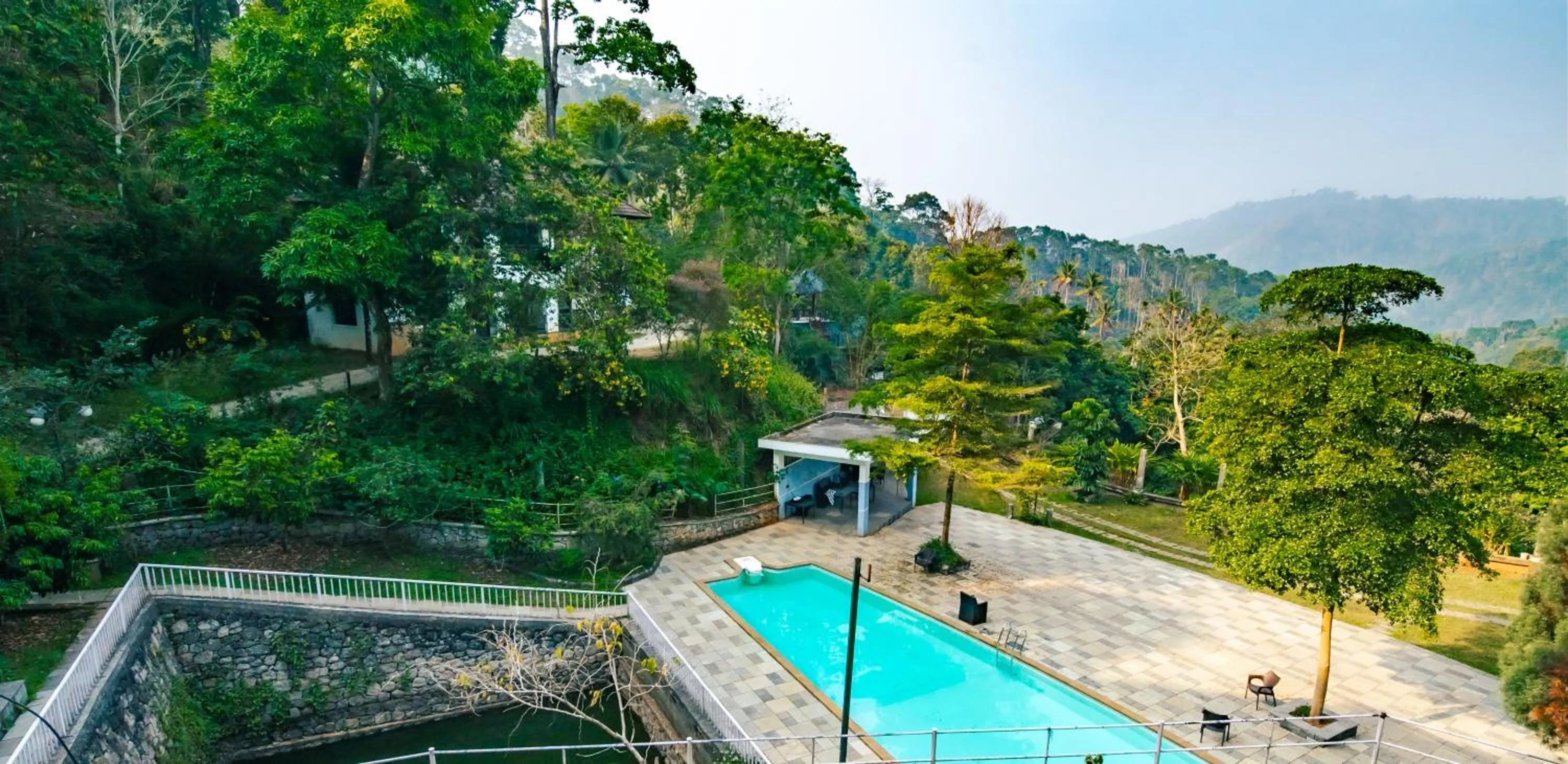 Swimming pool in Southern Panorama Indriya Resorts & Spa