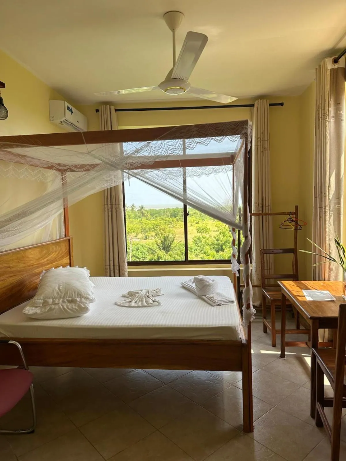 Bed in Mikoko Beach & Cottages