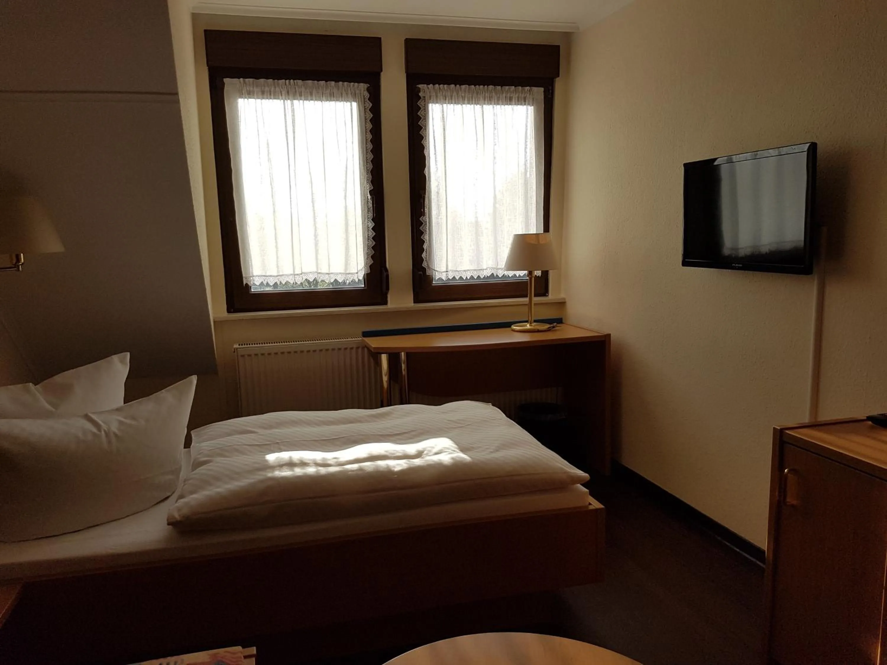 Photo of the whole room, Bed in Hotel Zum Anger