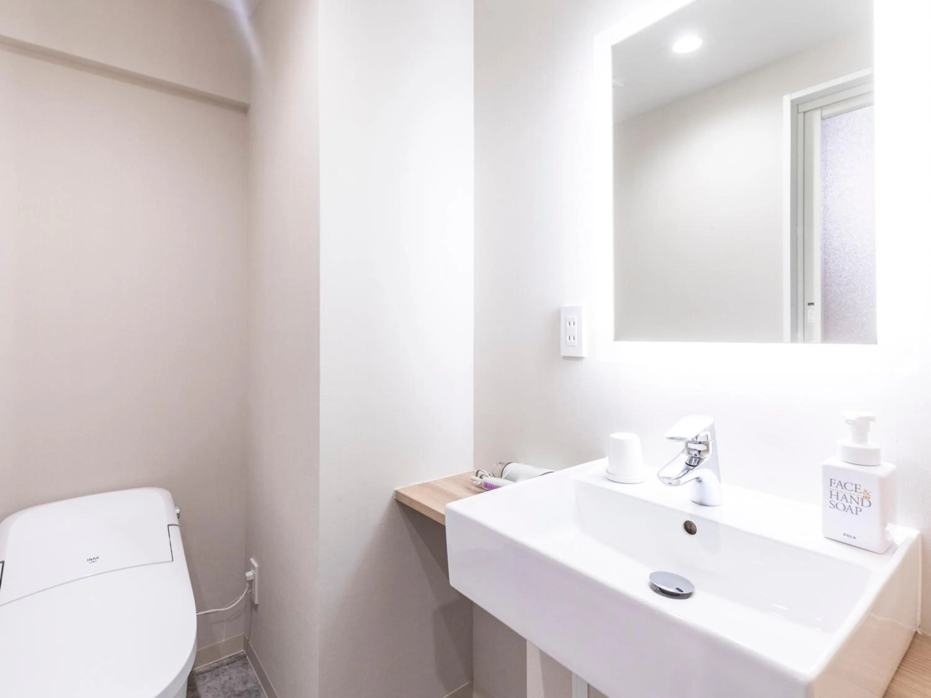 Toilet in Trust Hotel