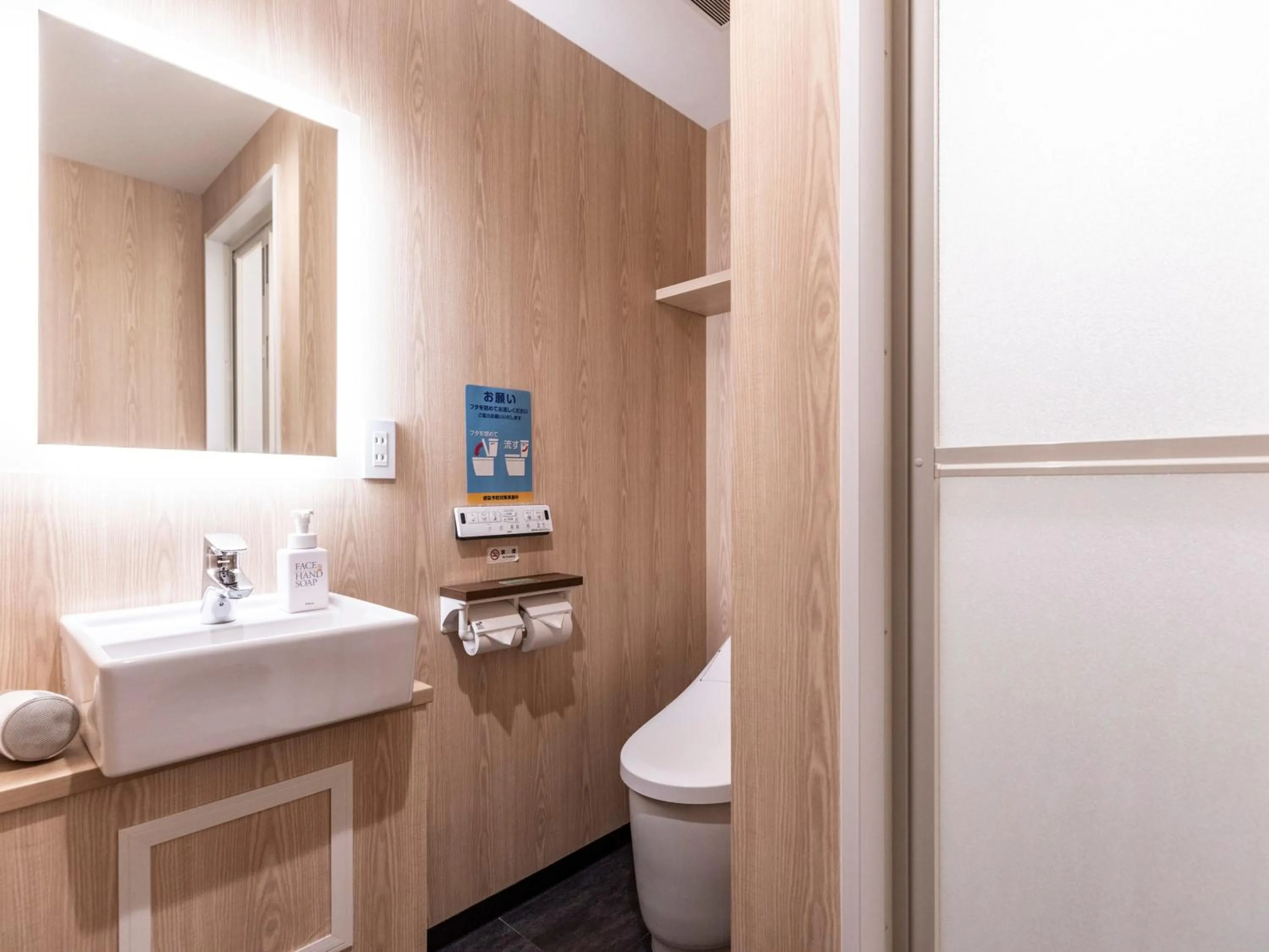 Toilet in Trust Hotel