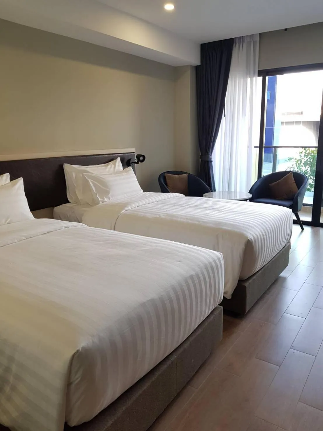 Bed in Lewit Hotel Pattaya, a member of Radisson Individuals