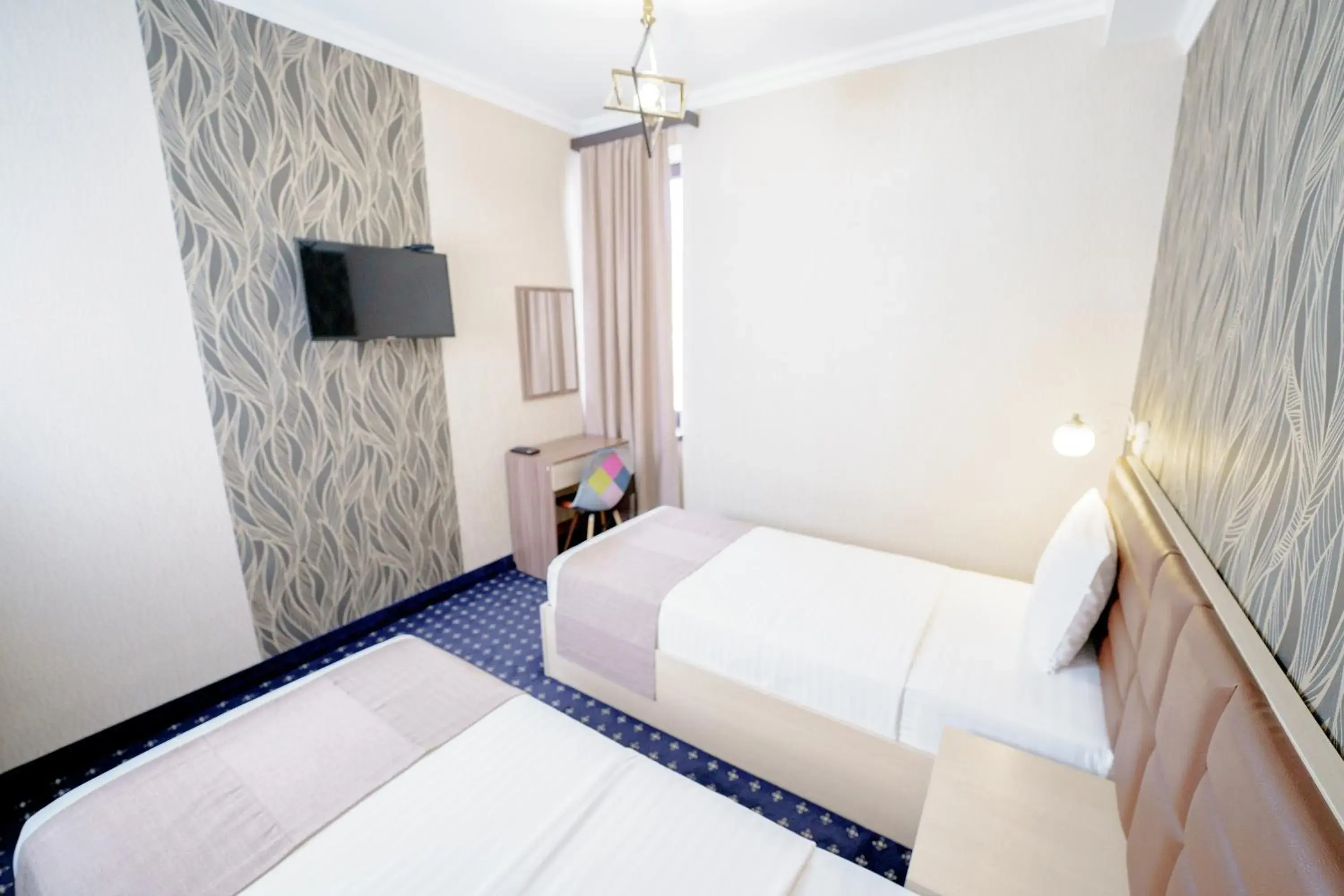 Family Room in Welcome Inn Hotel Family Room in Welcome Inn Hotel