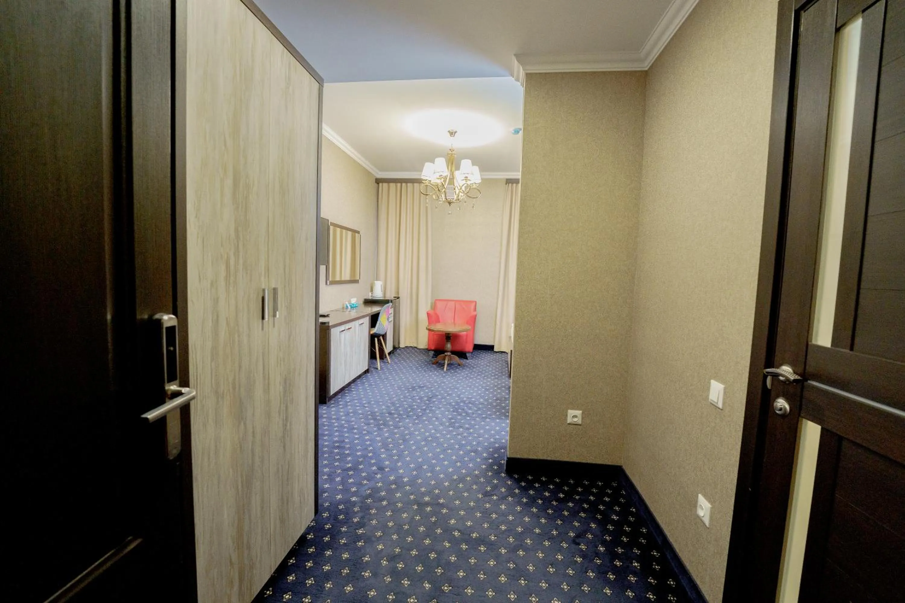 Living room in Welcome Inn Hotel