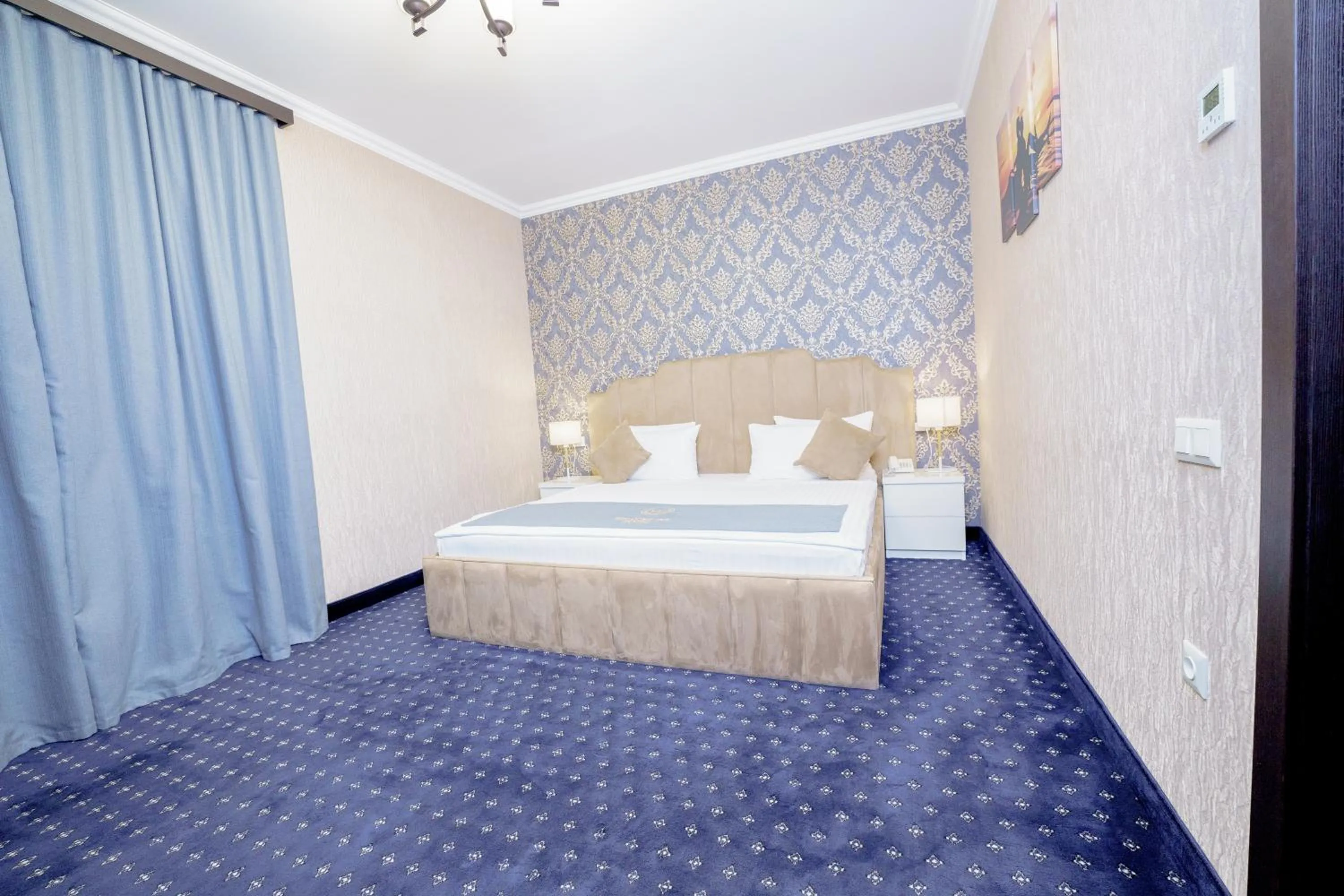 Bedroom, Bed in Welcome Inn Hotel