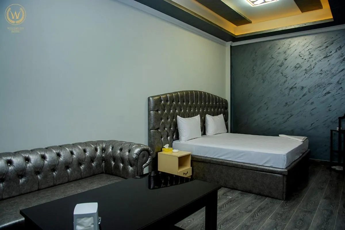 Bed in Welcome Inn Hotel