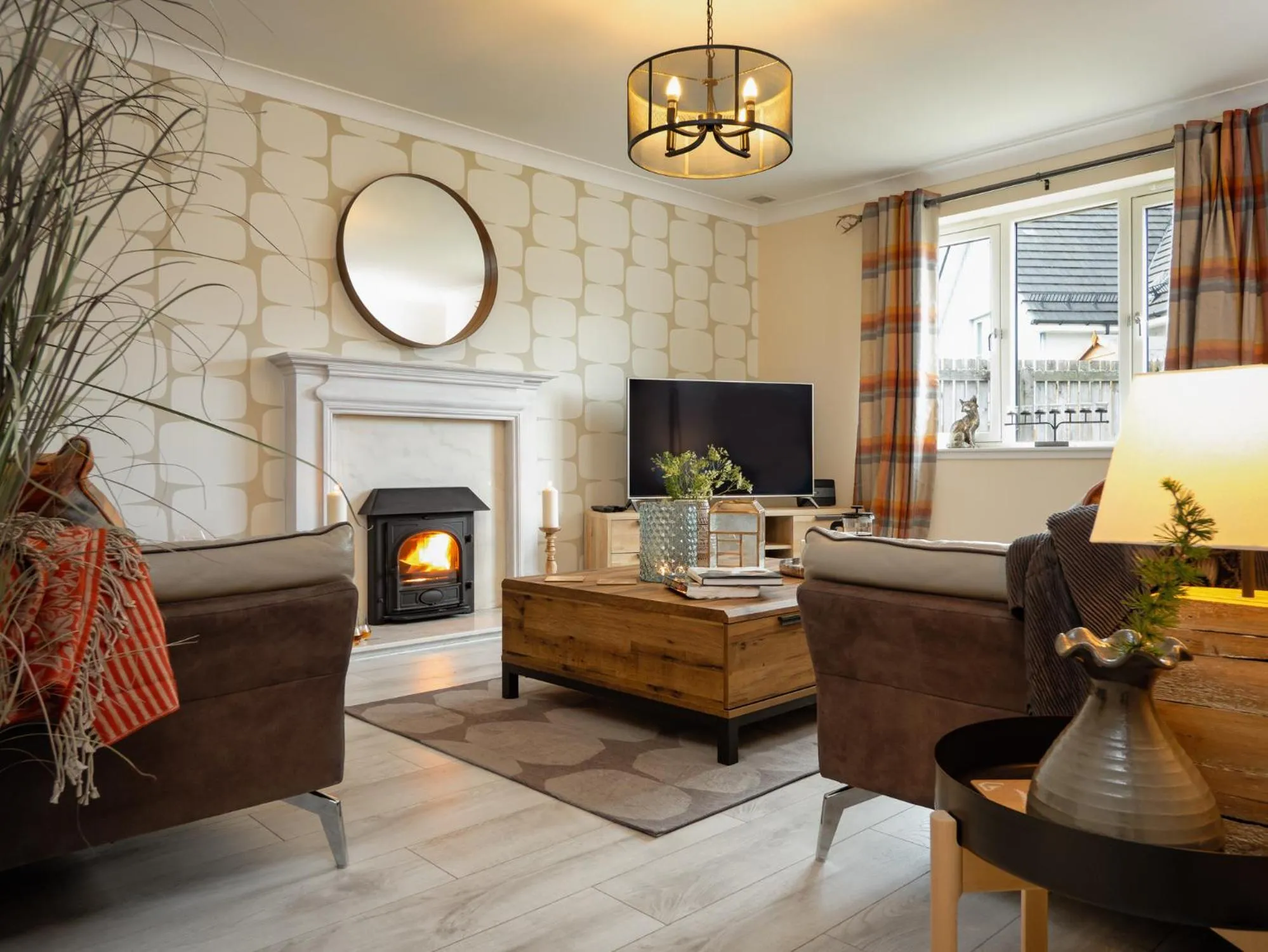 Communal lounge/ TV room in Eagle Lodge - Aviemore Lodges
