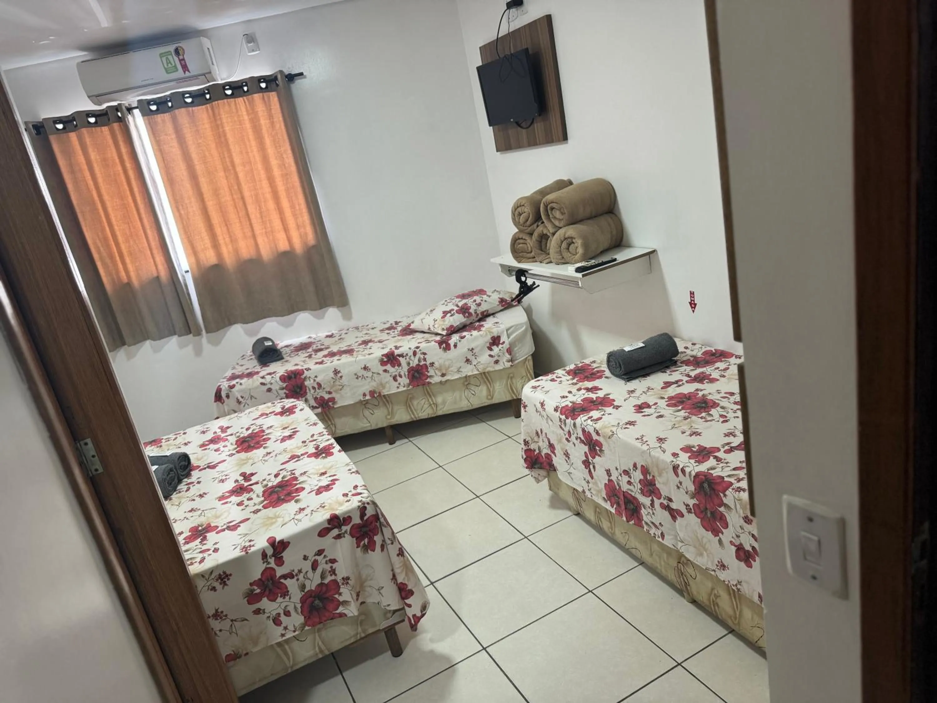 TV and multimedia, Bed in Pousada Bella Vista