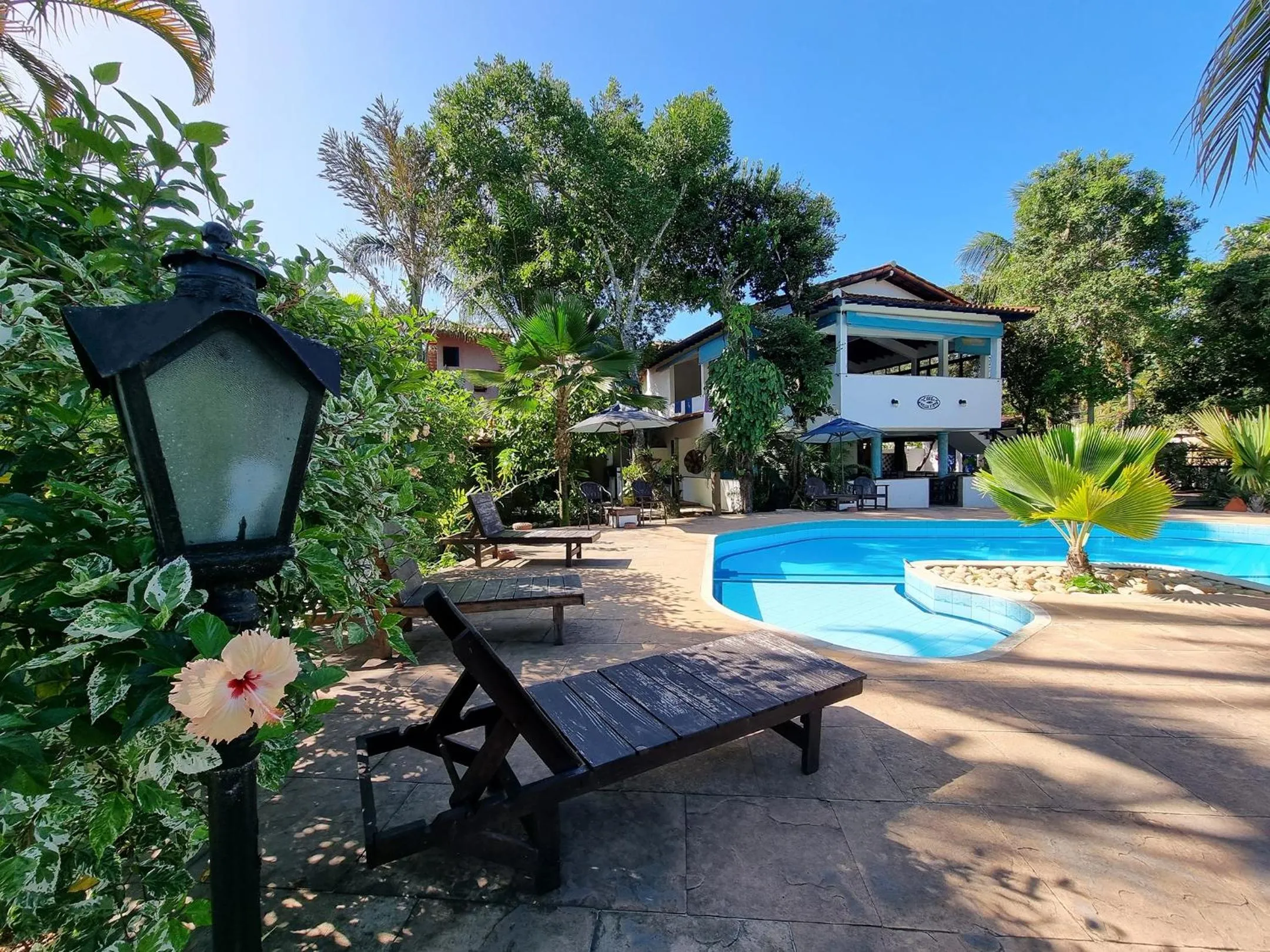 Swimming pool in Pousada Solar das Orquídeas