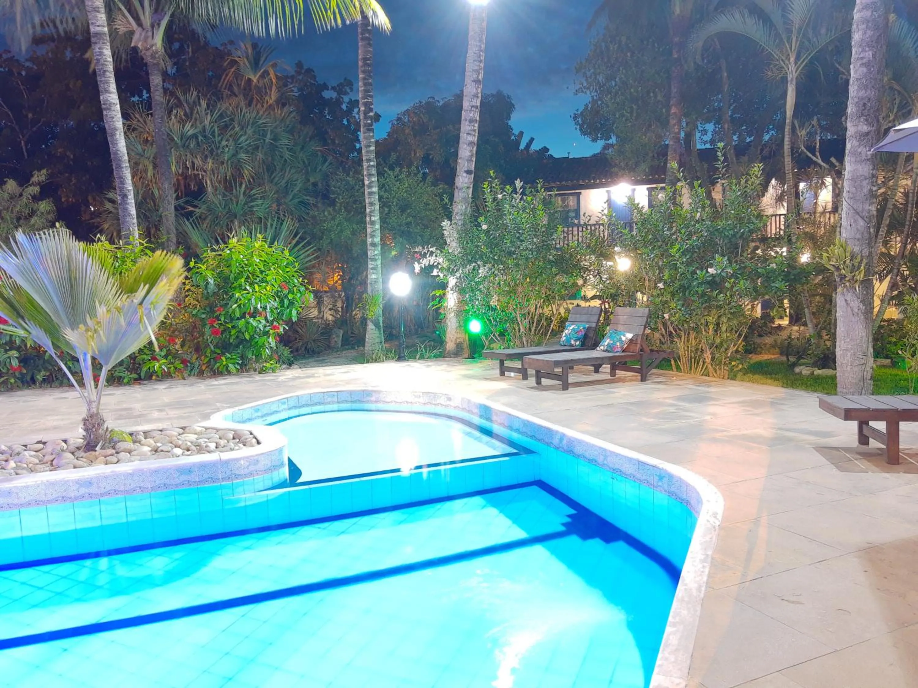 Swimming pool in Pousada Solar das Orquídeas
