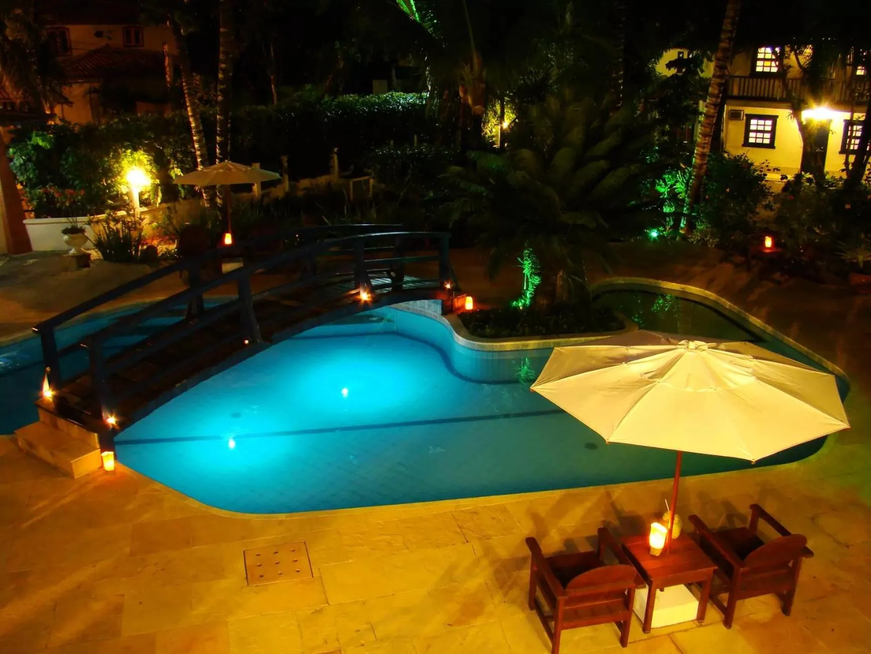Pool view in Pousada Solar das Orquídeas