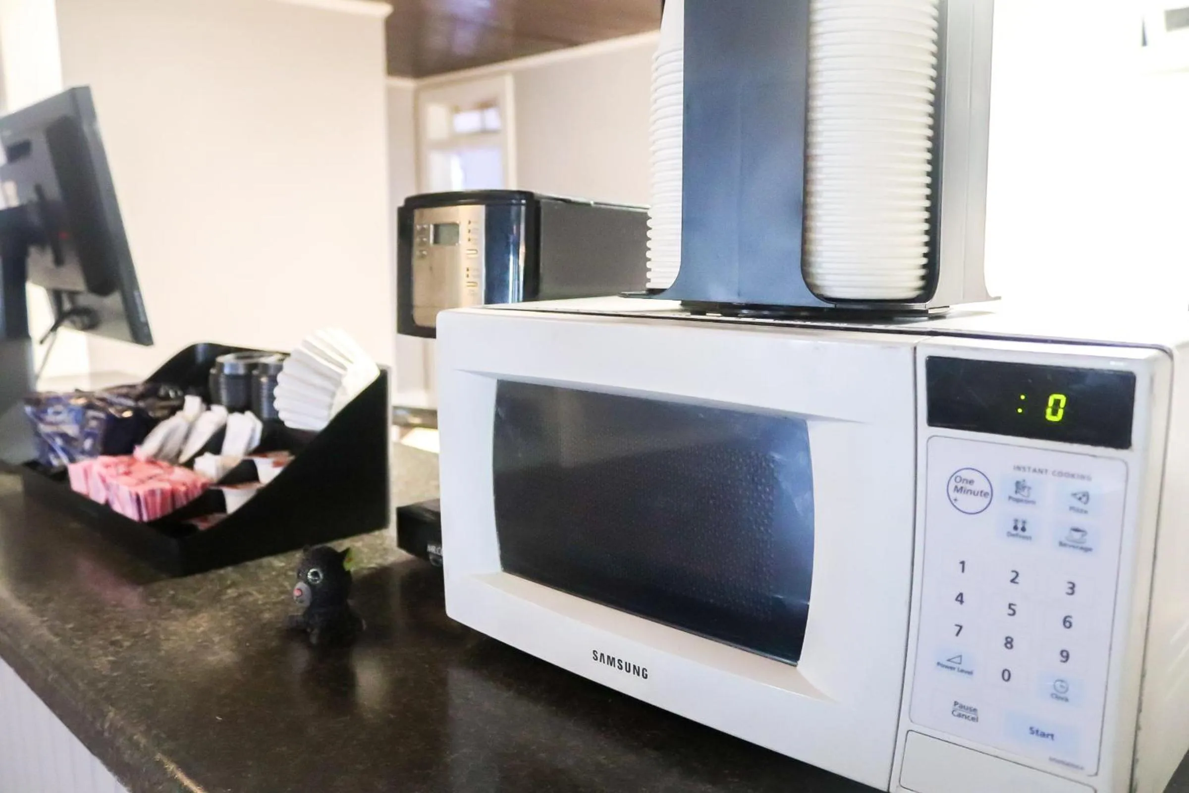 Communal lounge/ TV room in Bella's Boutique Hotel