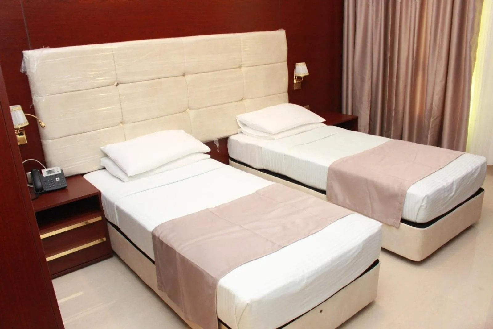 Bed in Golden Airport Hotel