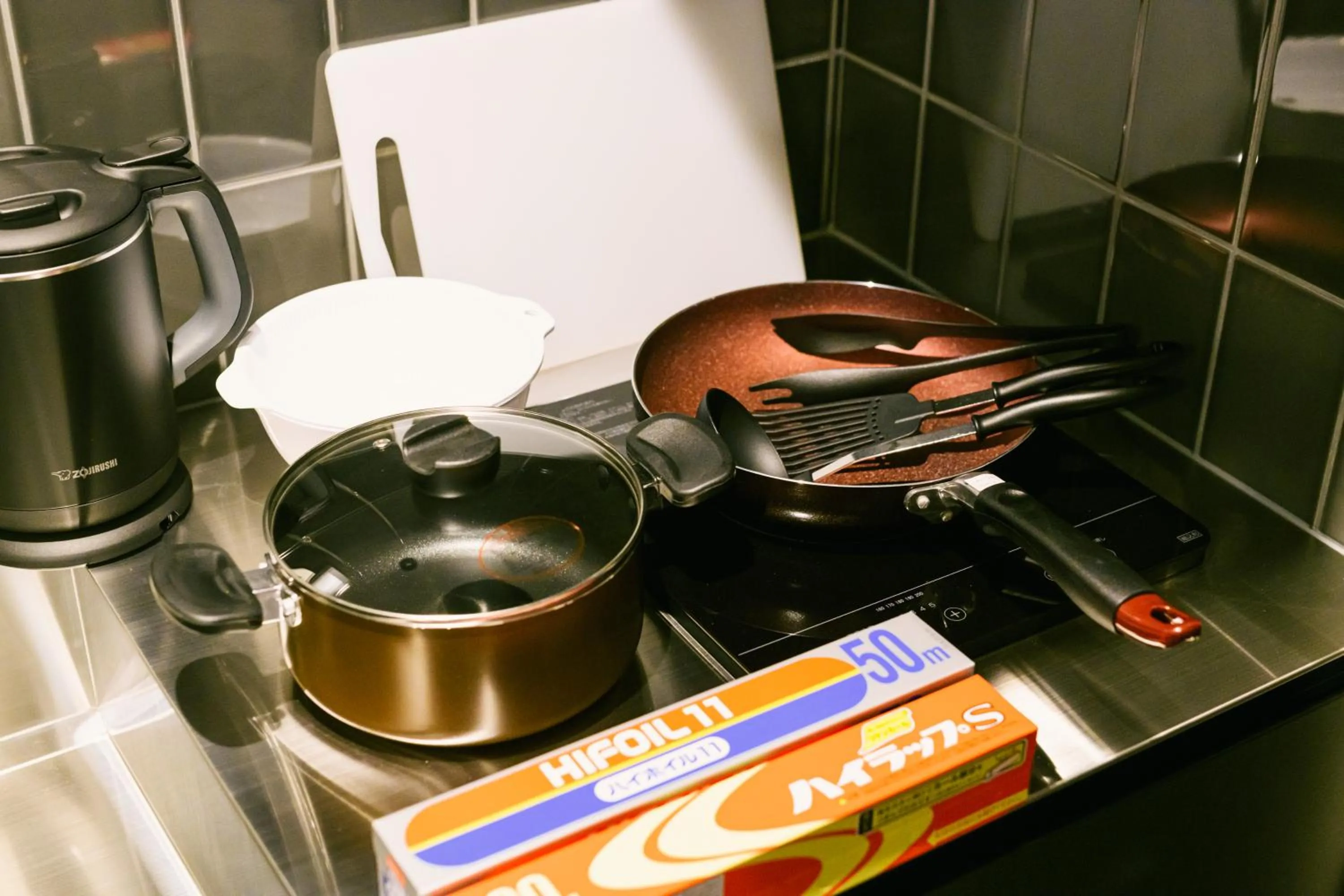 Kitchen or kitchenette in GRAND BASE Hakata Premium