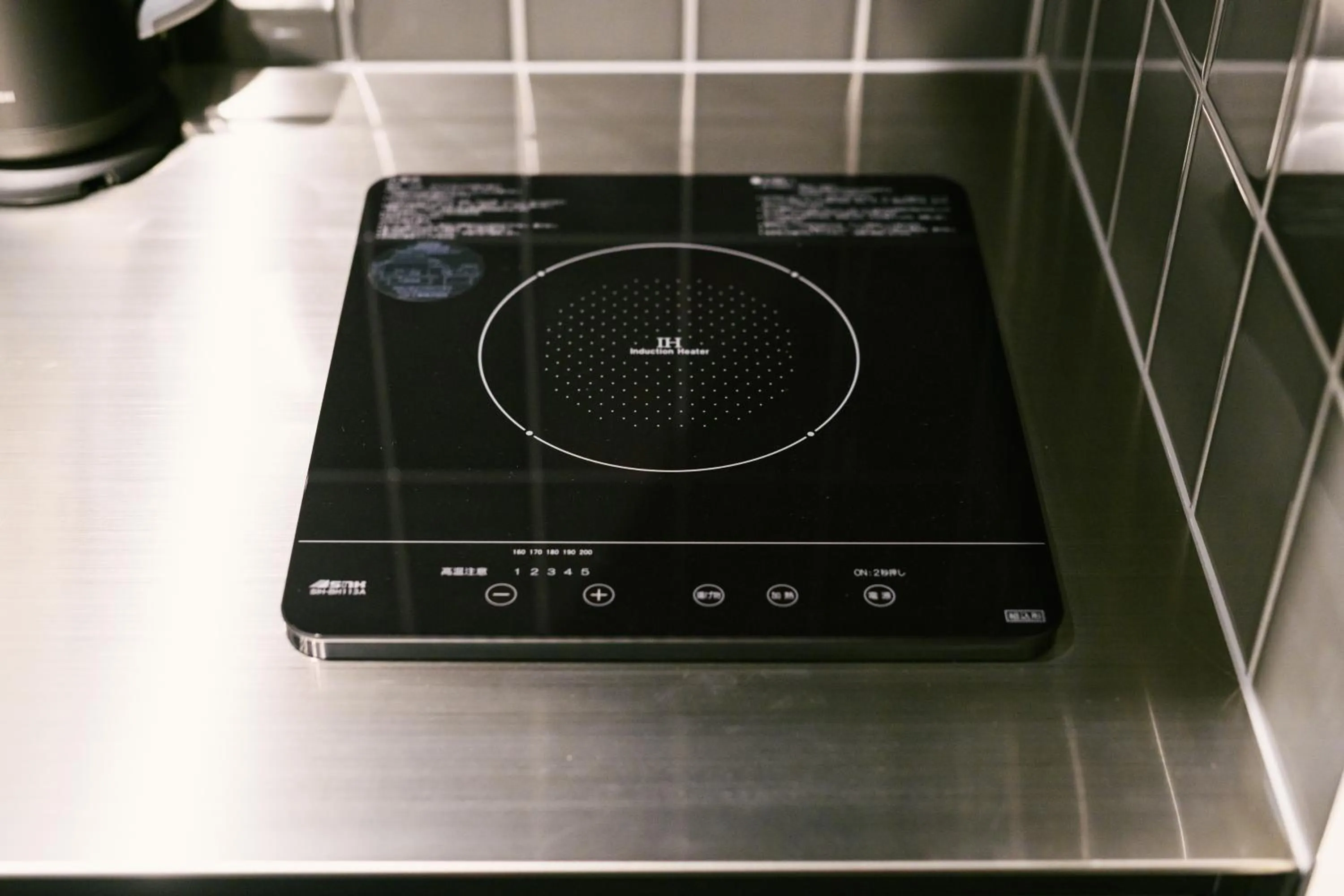 Kitchen or kitchenette in GRAND BASE Hakata Premium