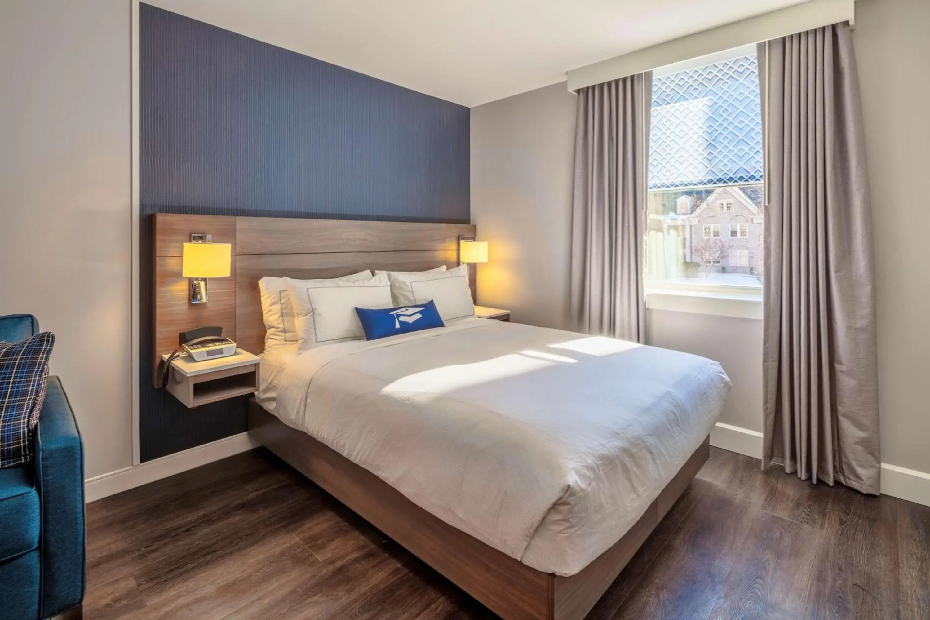 Living room, Bed in Scholar State College, Tapestry Collection by Hilton Living room, Bed in Scholar State College, Tapestry Collection by Hilton