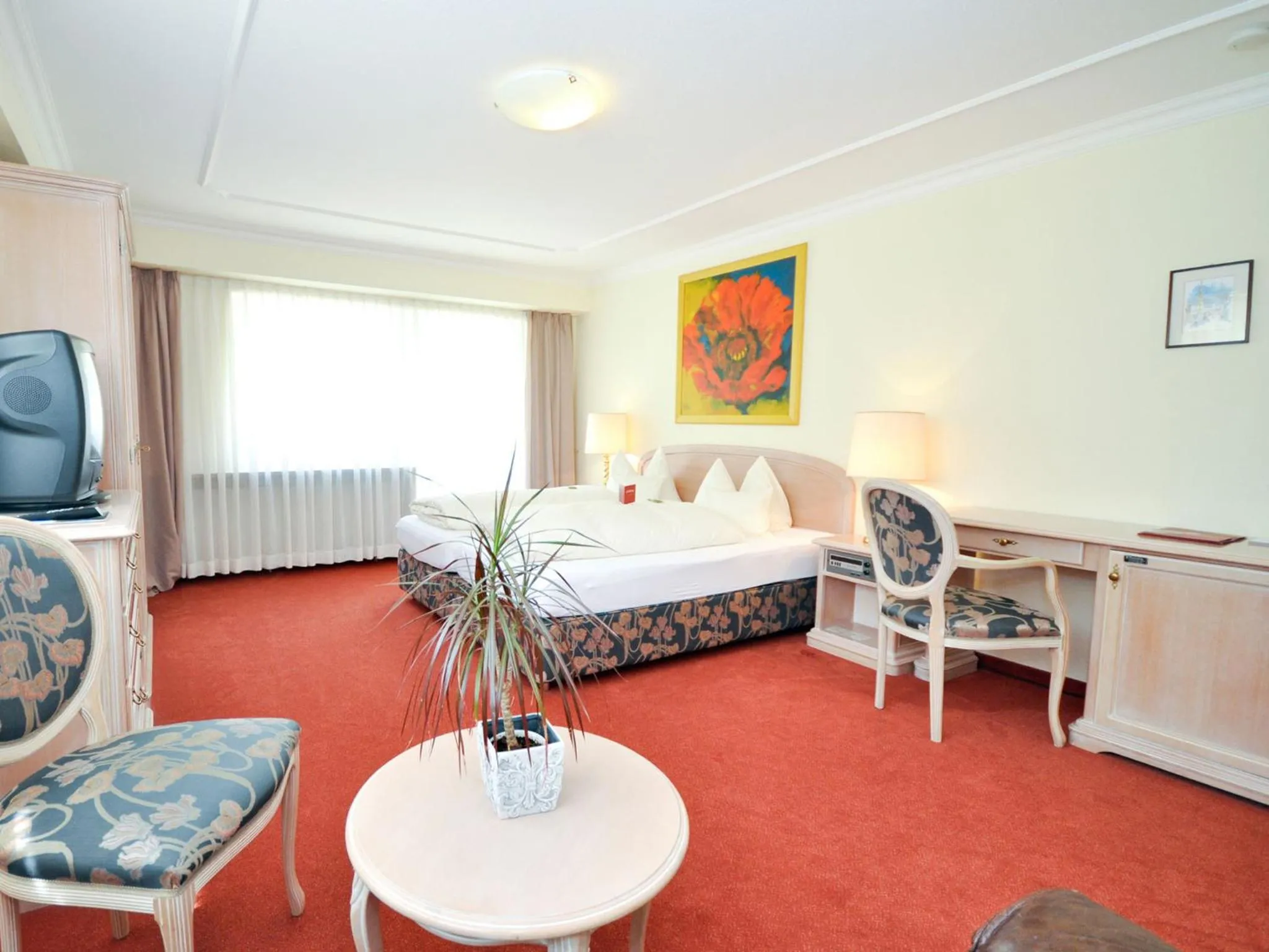 Photo of the whole room, Bed in Hotel Quellenhof