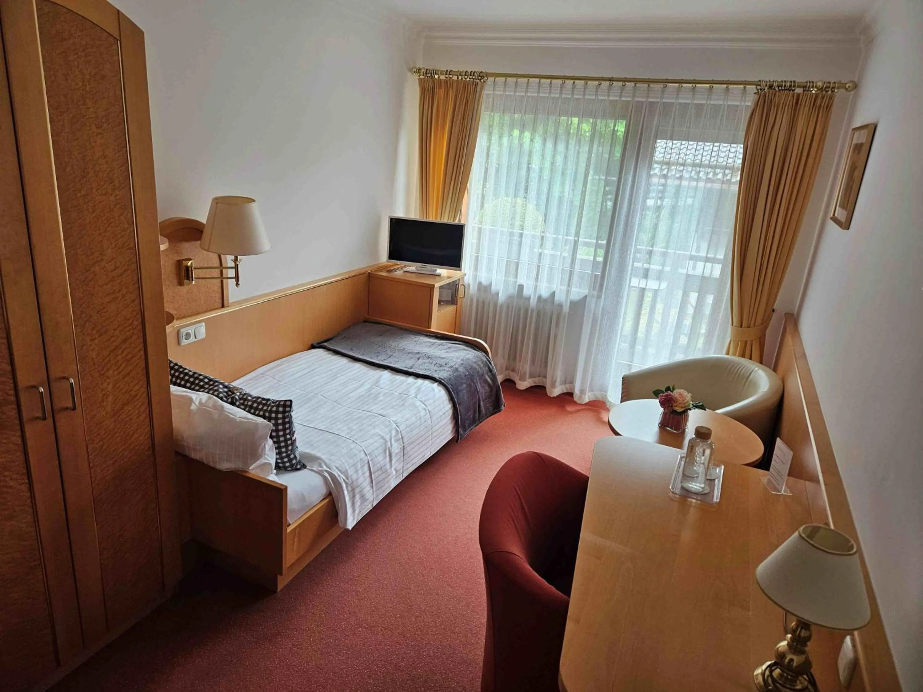 Photo of the whole room, Bed in Hotel Quellenhof