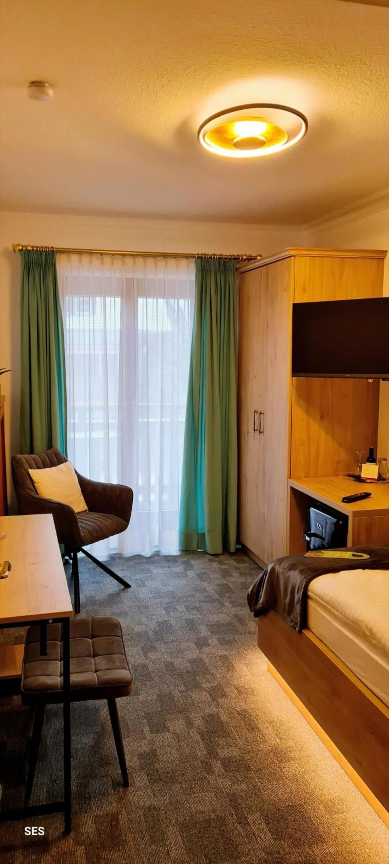 Photo of the whole room, Bed in Hotel Quellenhof