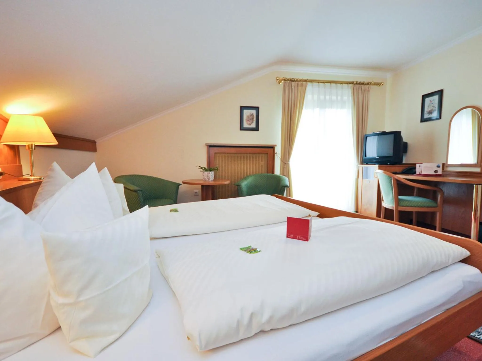 Photo of the whole room, Bed in Hotel Quellenhof