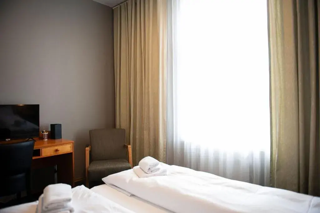 Bed in Henriks Hotell Bed in Henriks Hotell