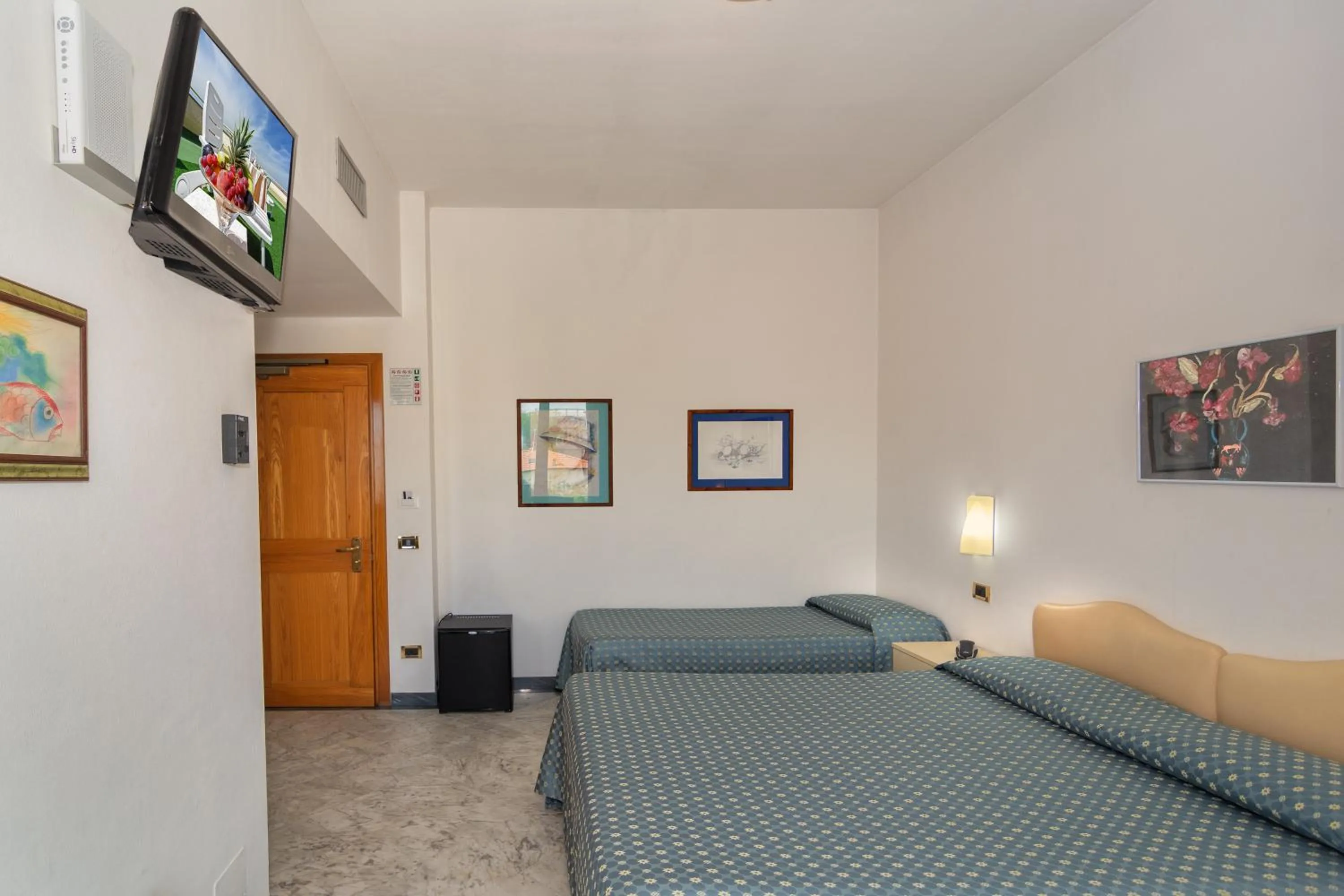 Bed in Hotel Mariotti