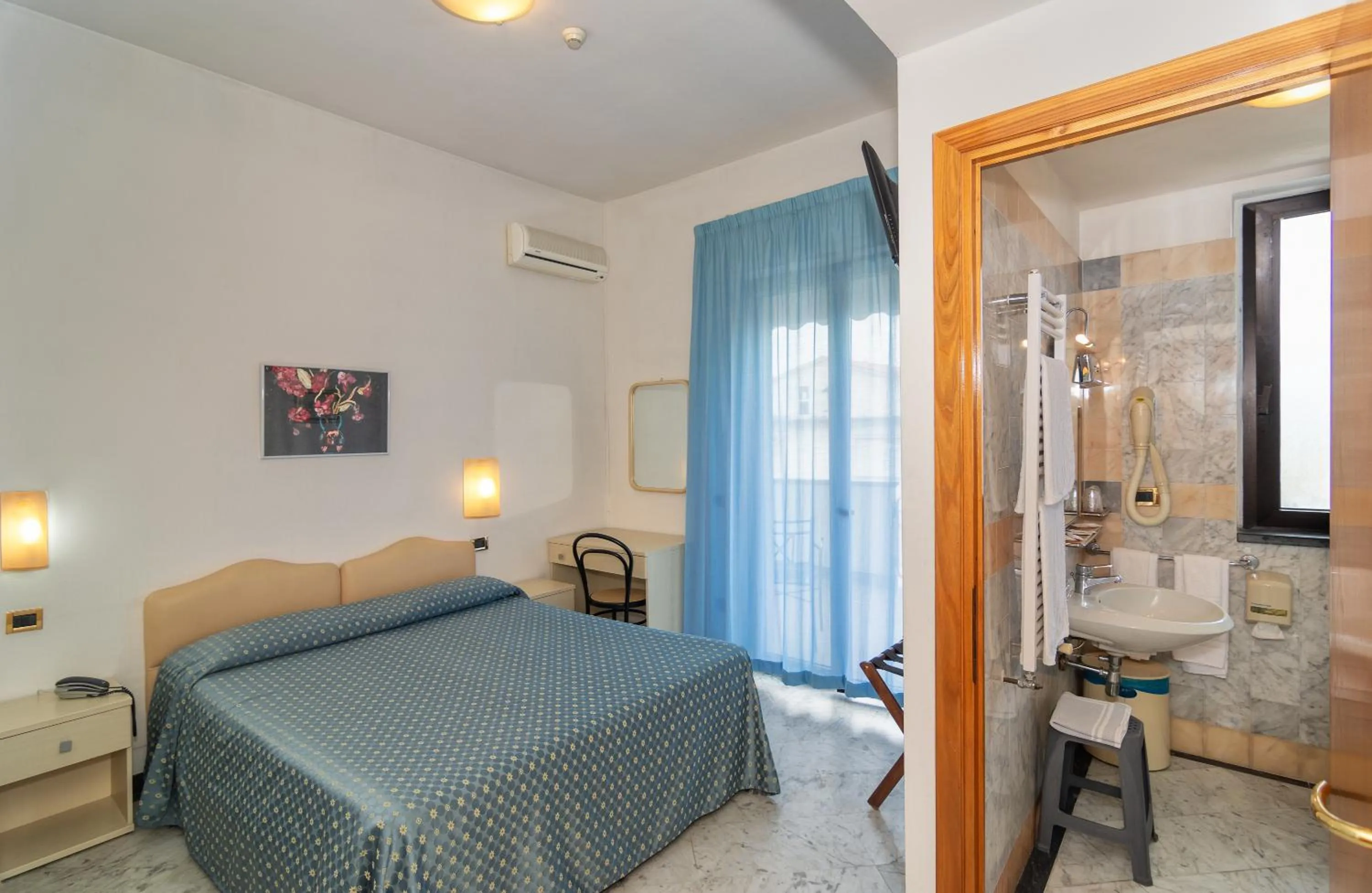 Bed in Hotel Mariotti