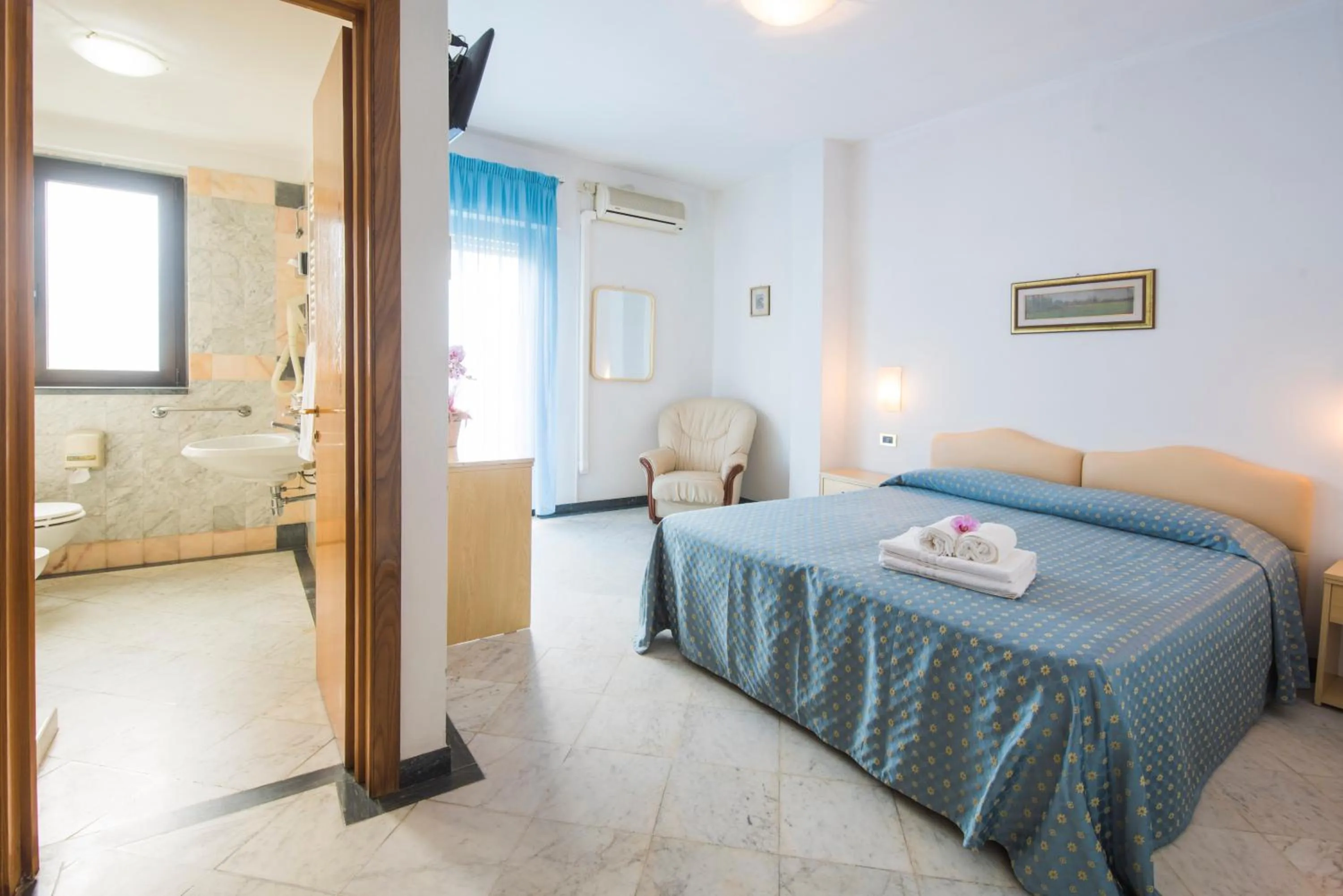 Bed in Hotel Mariotti