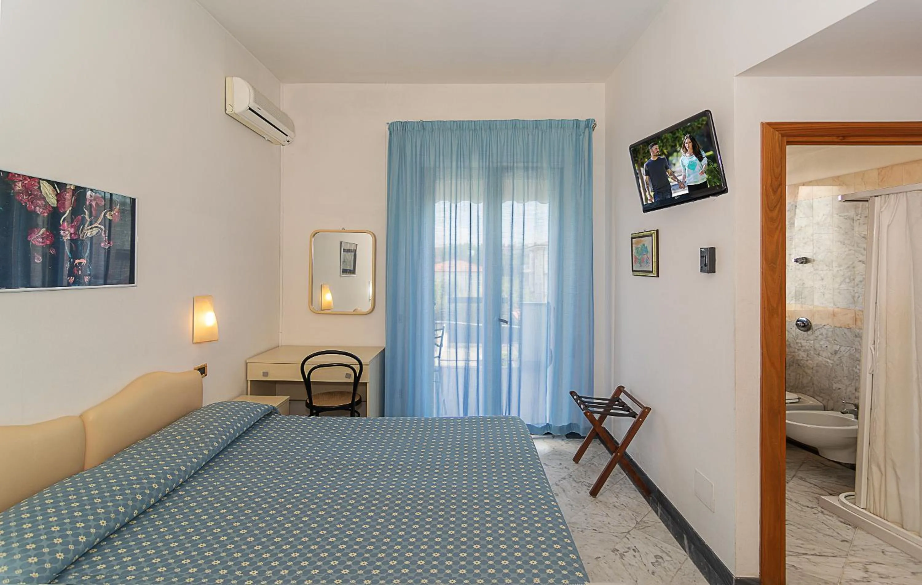 Bed in Hotel Mariotti