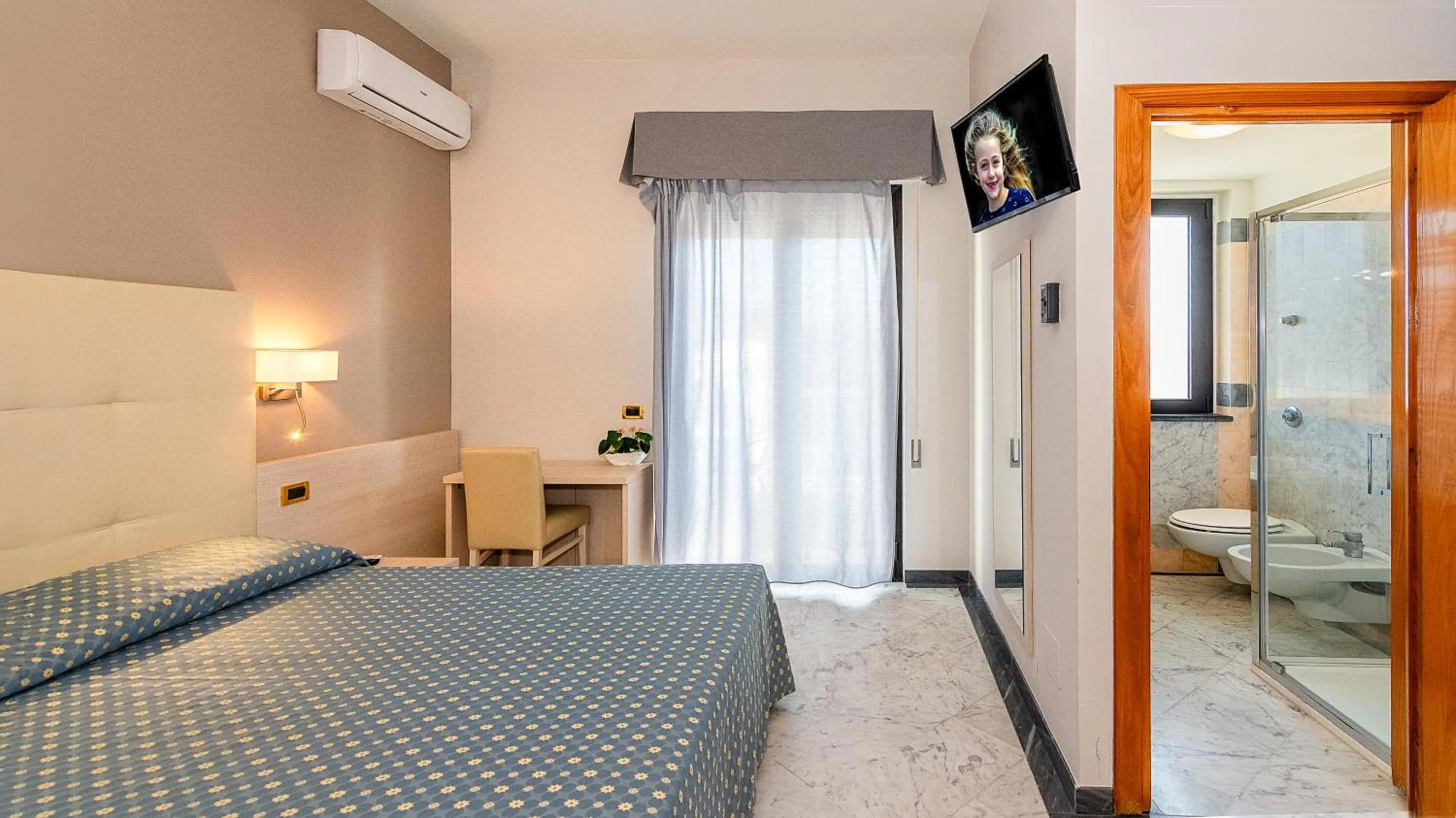 Bed in Hotel Mariotti