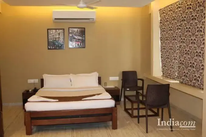 Photo of the whole room, Bed in Hotel Darshan Vishwas Photo of the whole room, Bed in Hotel Darshan Vishwas