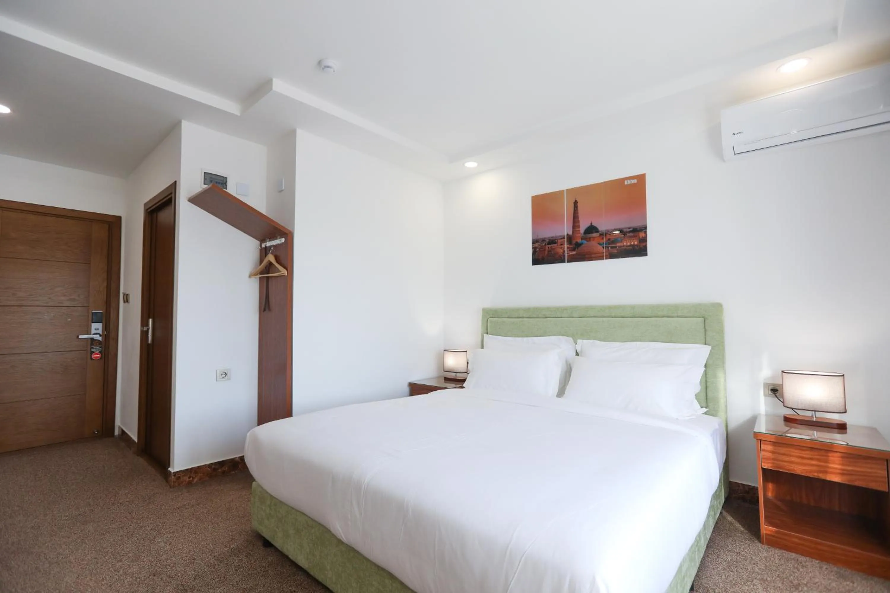 Bed in Sunrise Hotel