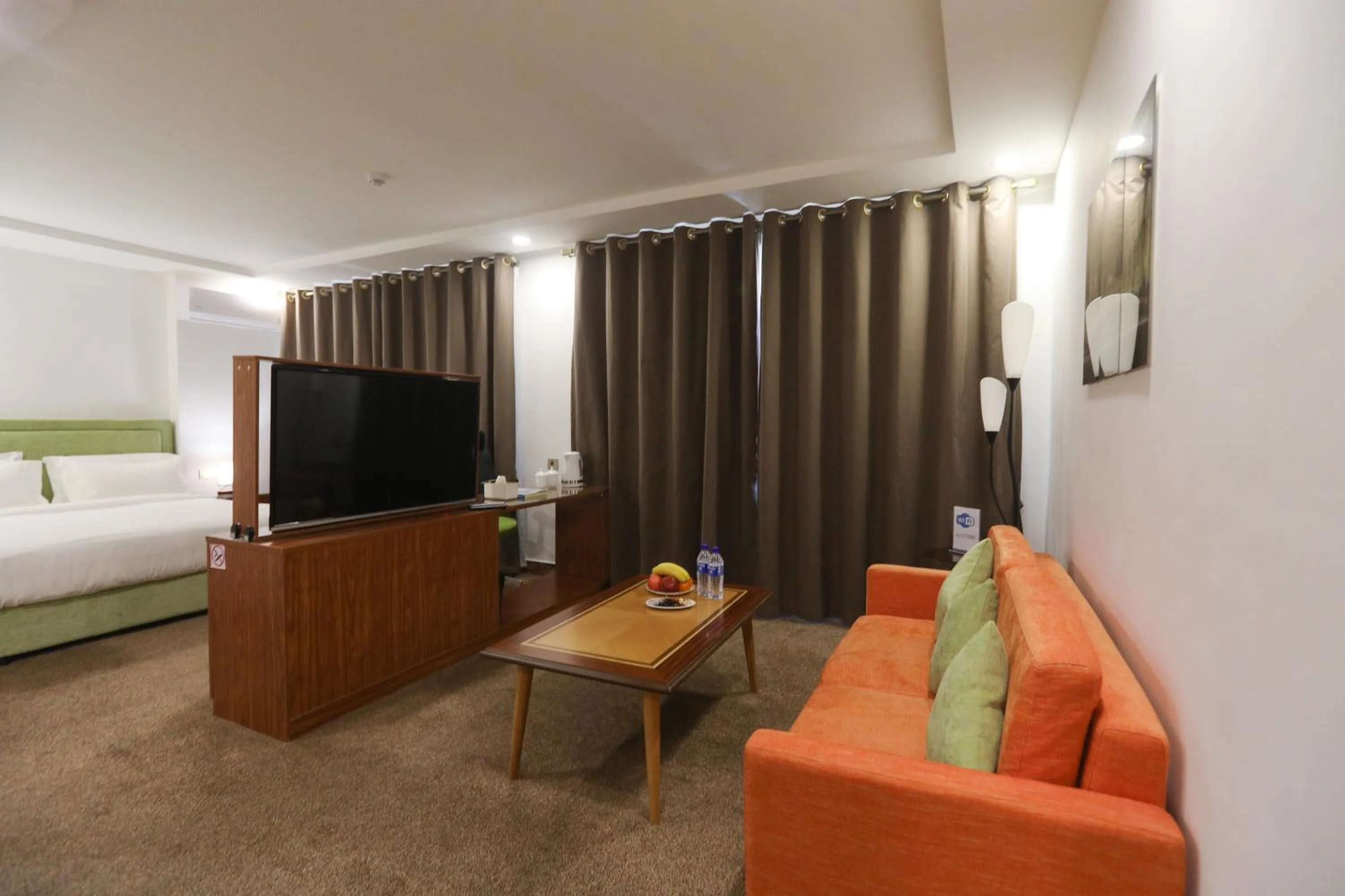 Bed in Sunrise Hotel