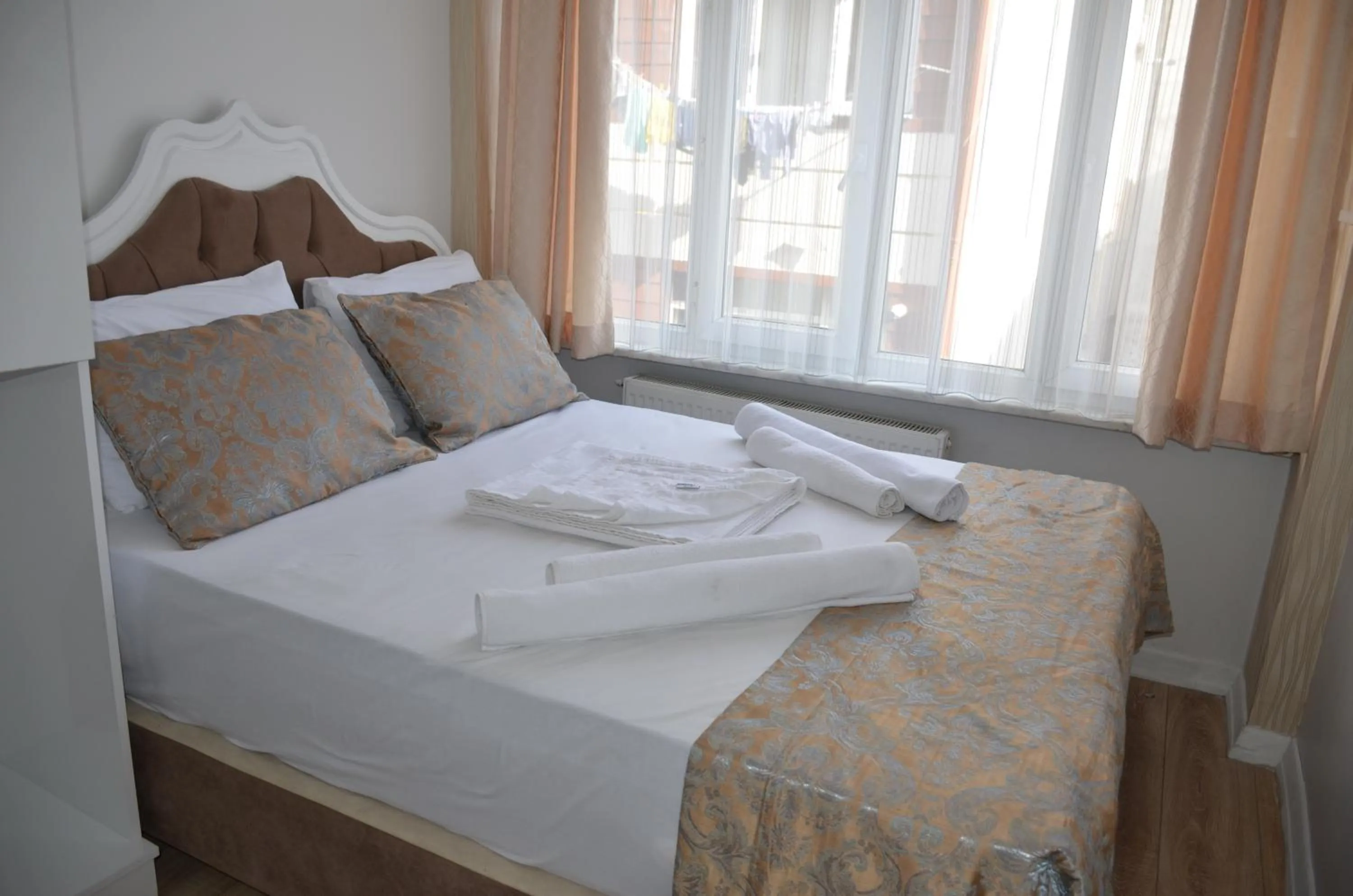 Bed in TABRİZ HOTEL