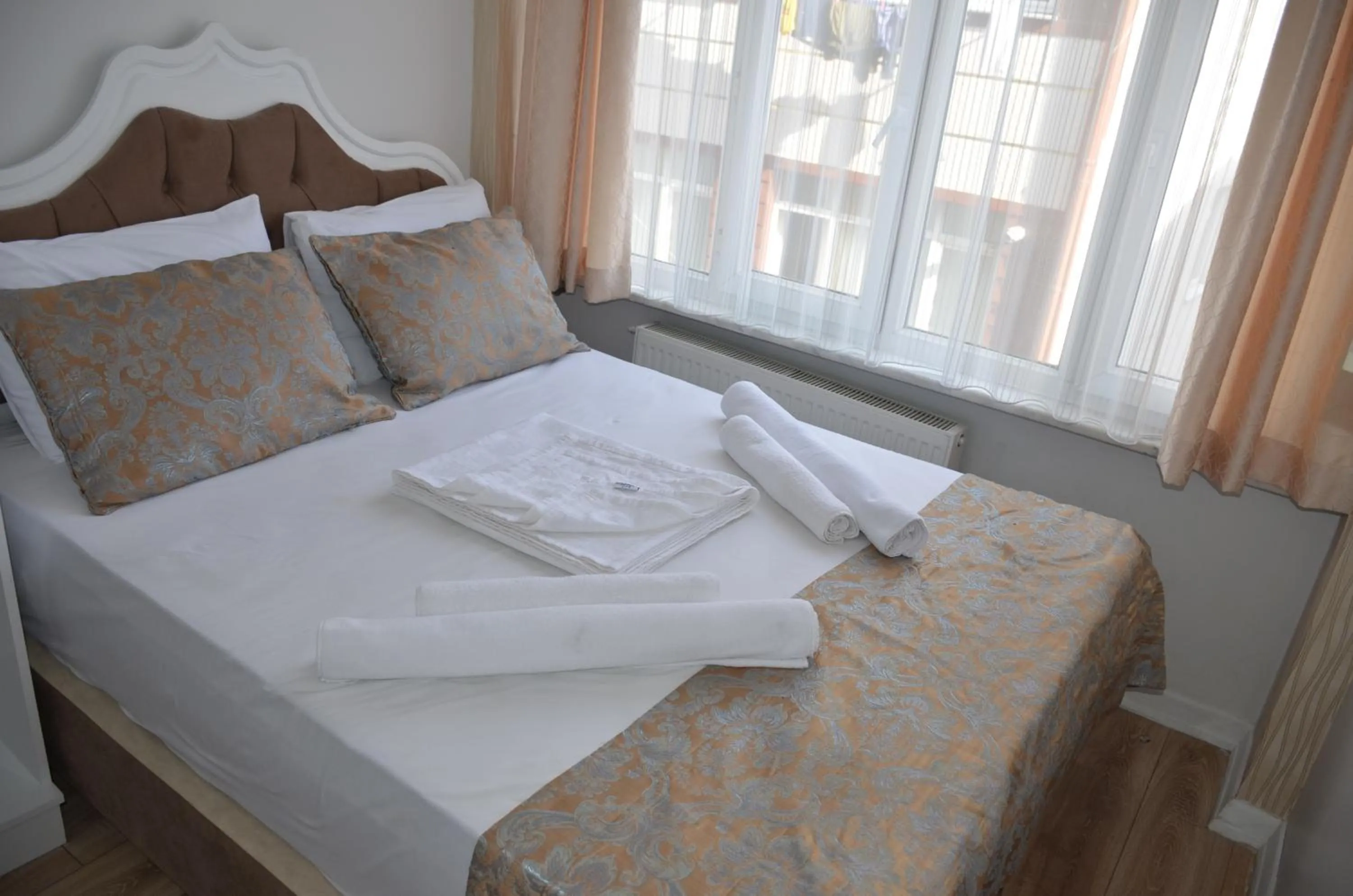 Bed in TABRİZ HOTEL