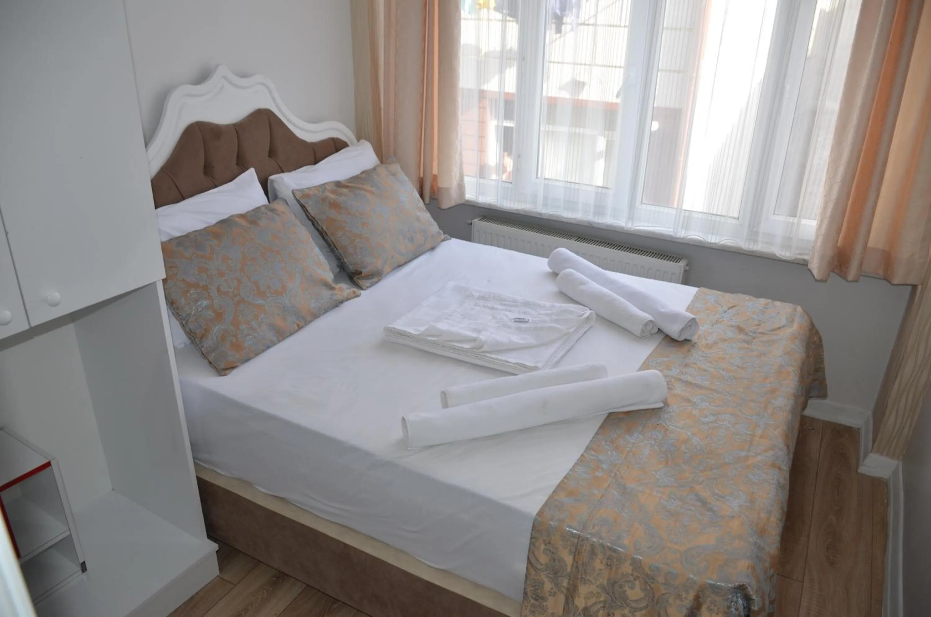 Bed in TABRİZ HOTEL