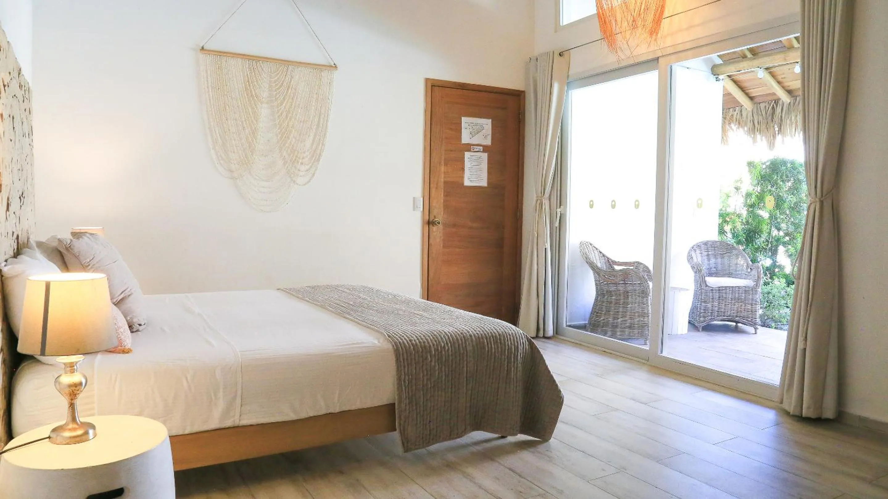 Bed in TAKUMA BOUTIK HOTEL