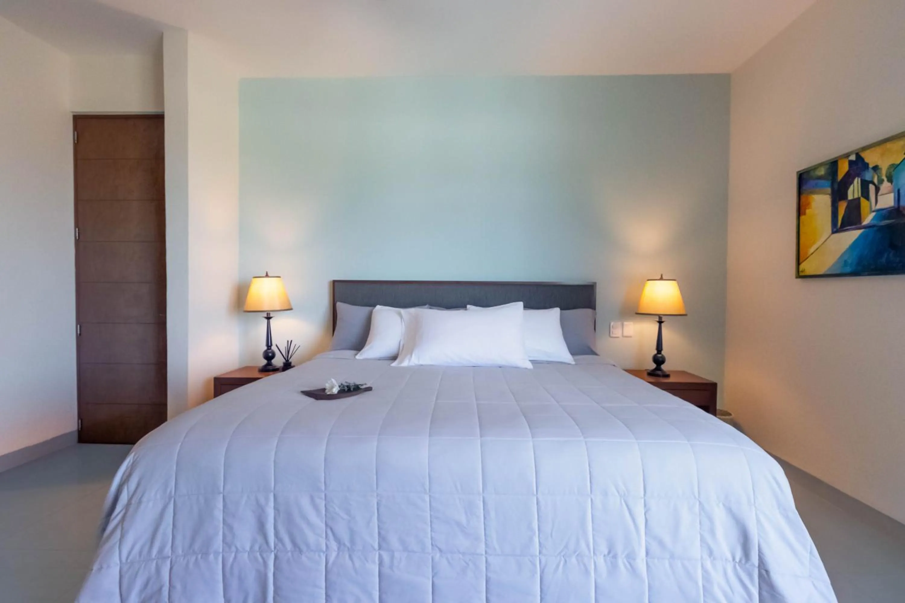 Bed in Sunset Condo 104 Puerta al Mar Isla Mujeres Mexico