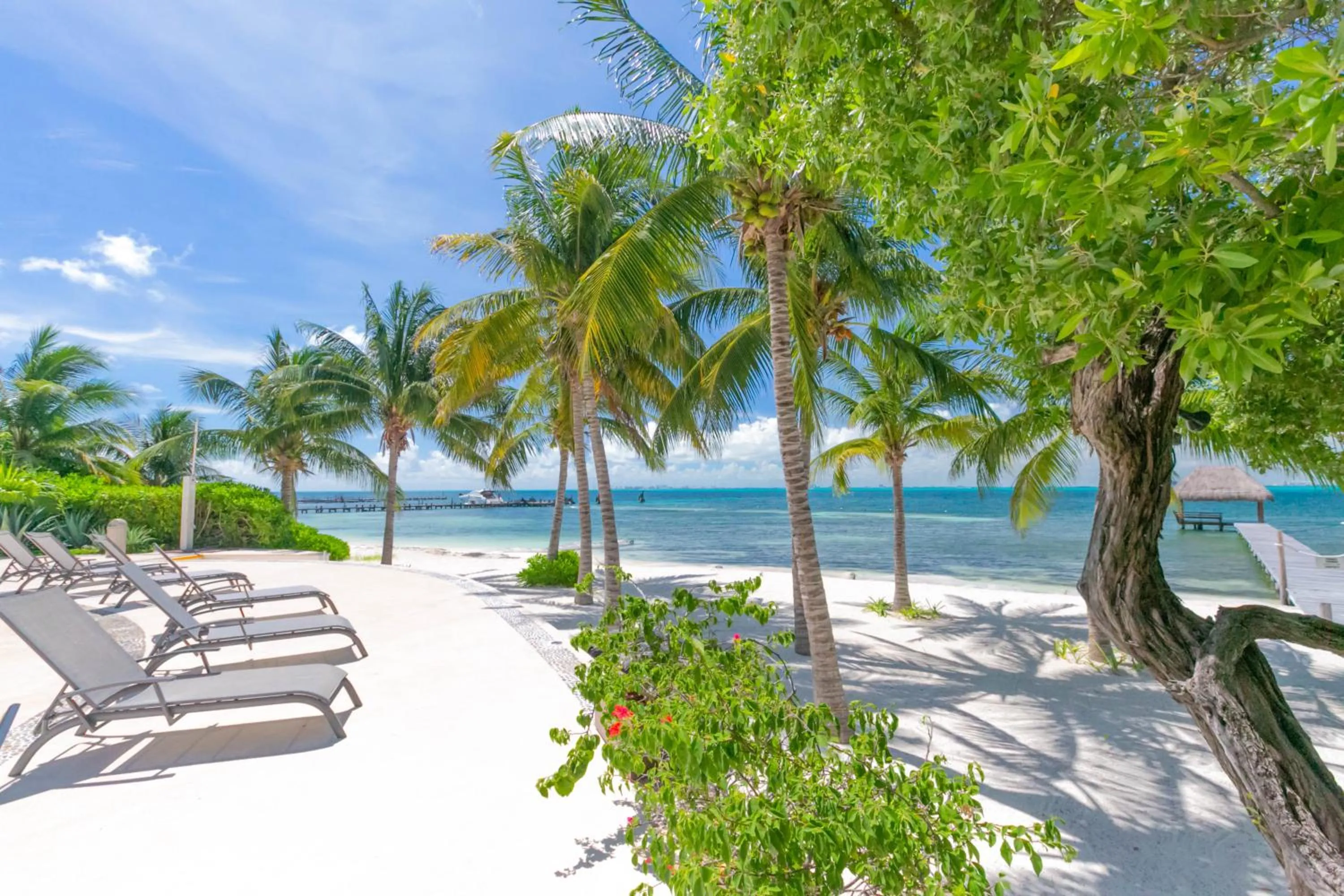 Beach in Sunset Condo 104 Puerta al Mar Isla Mujeres Mexico