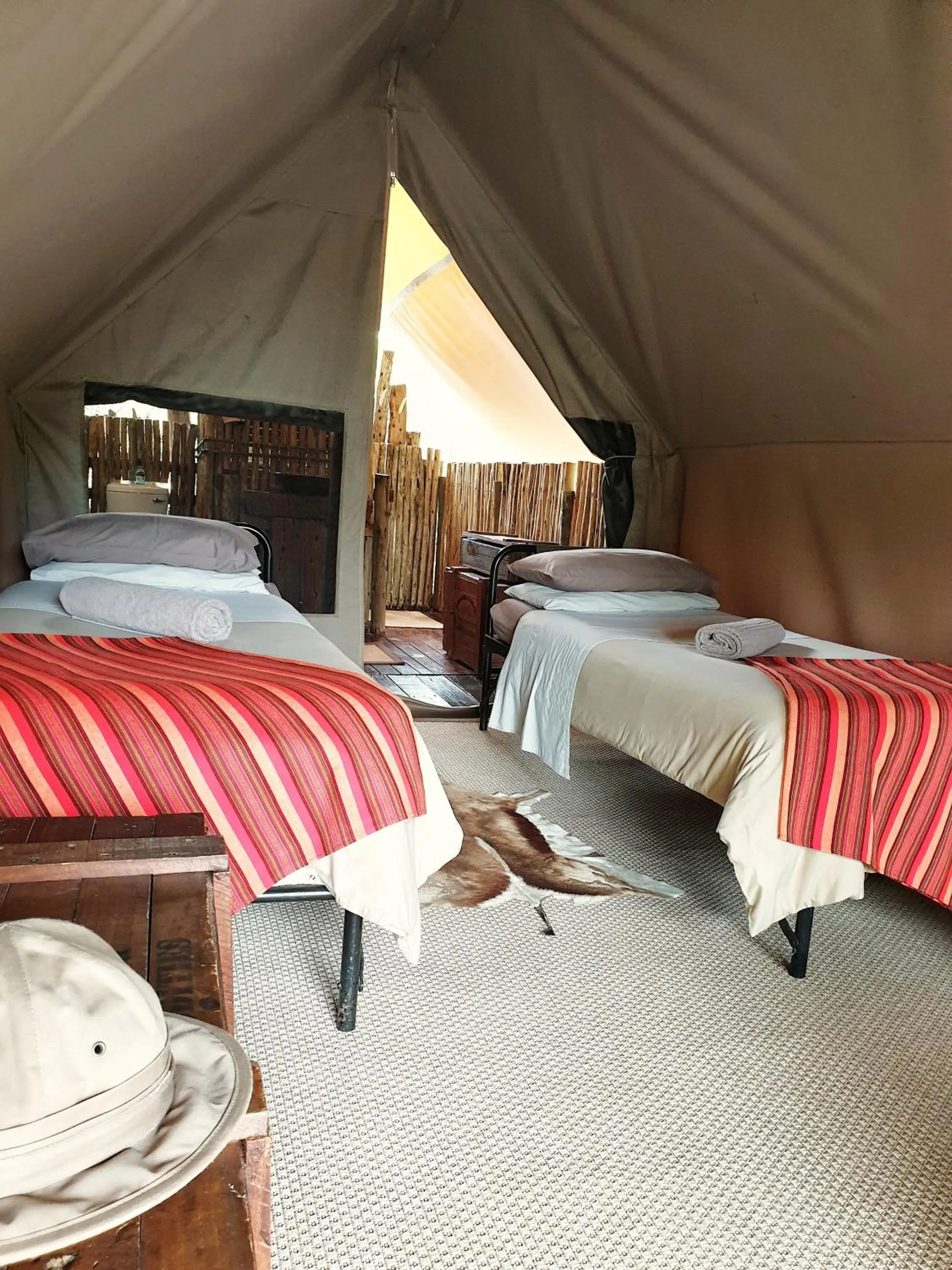 Bed in Quatermain's 1920's Safari Camp – Amakhala Game Reserve