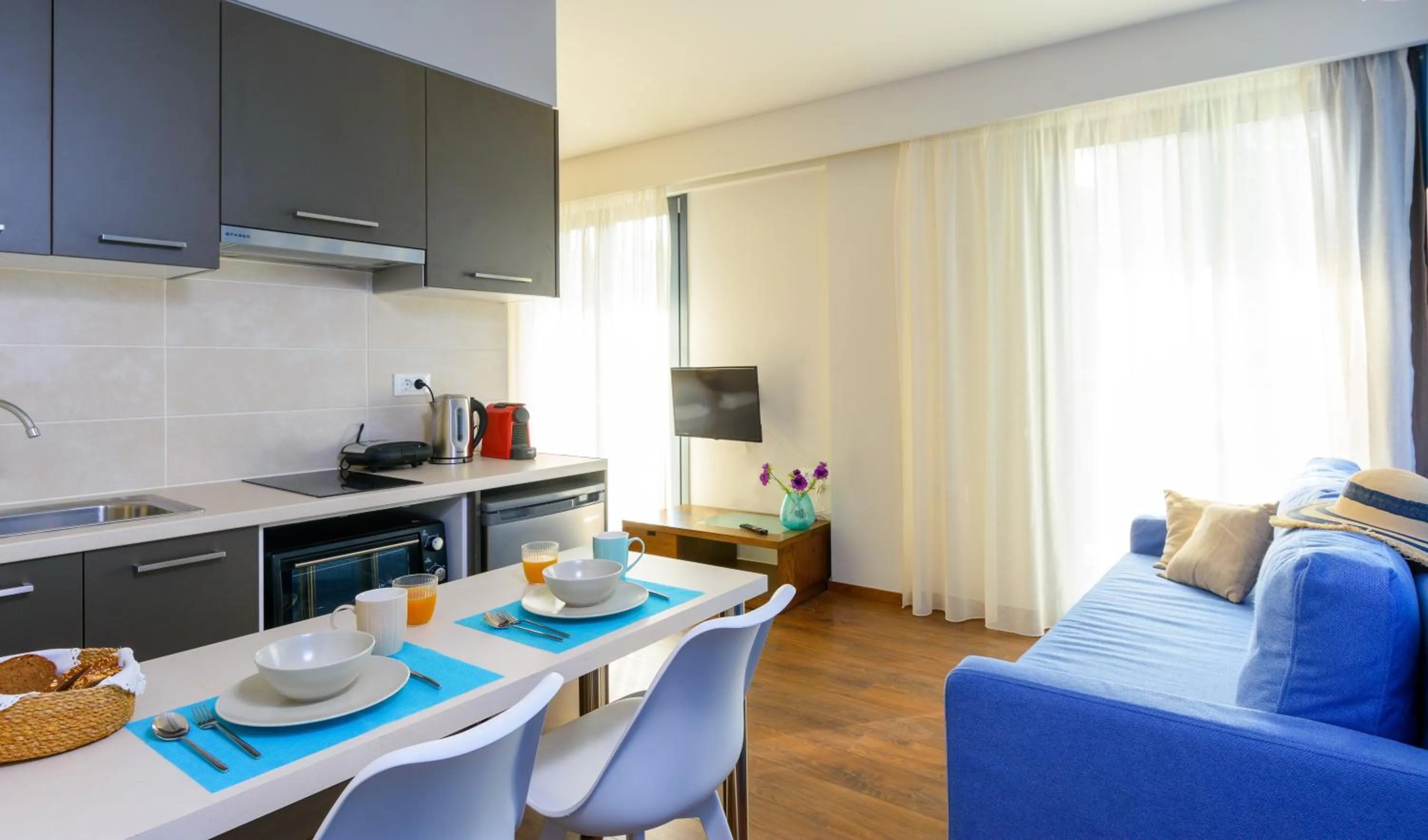 Kitchen or kitchenette in Elounda Colour Apartments