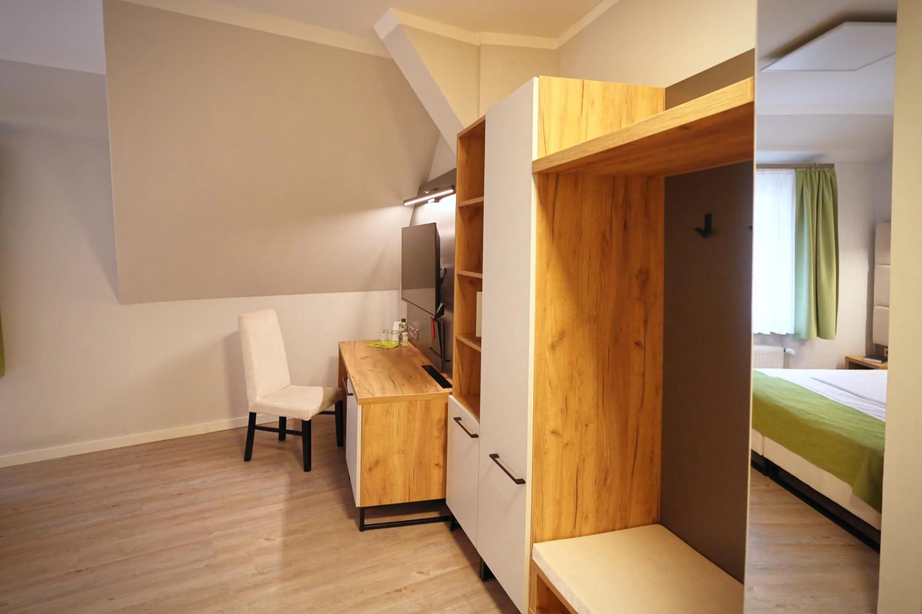 hair dresser, Bed in Hotel und Restaurant Kranichsberg