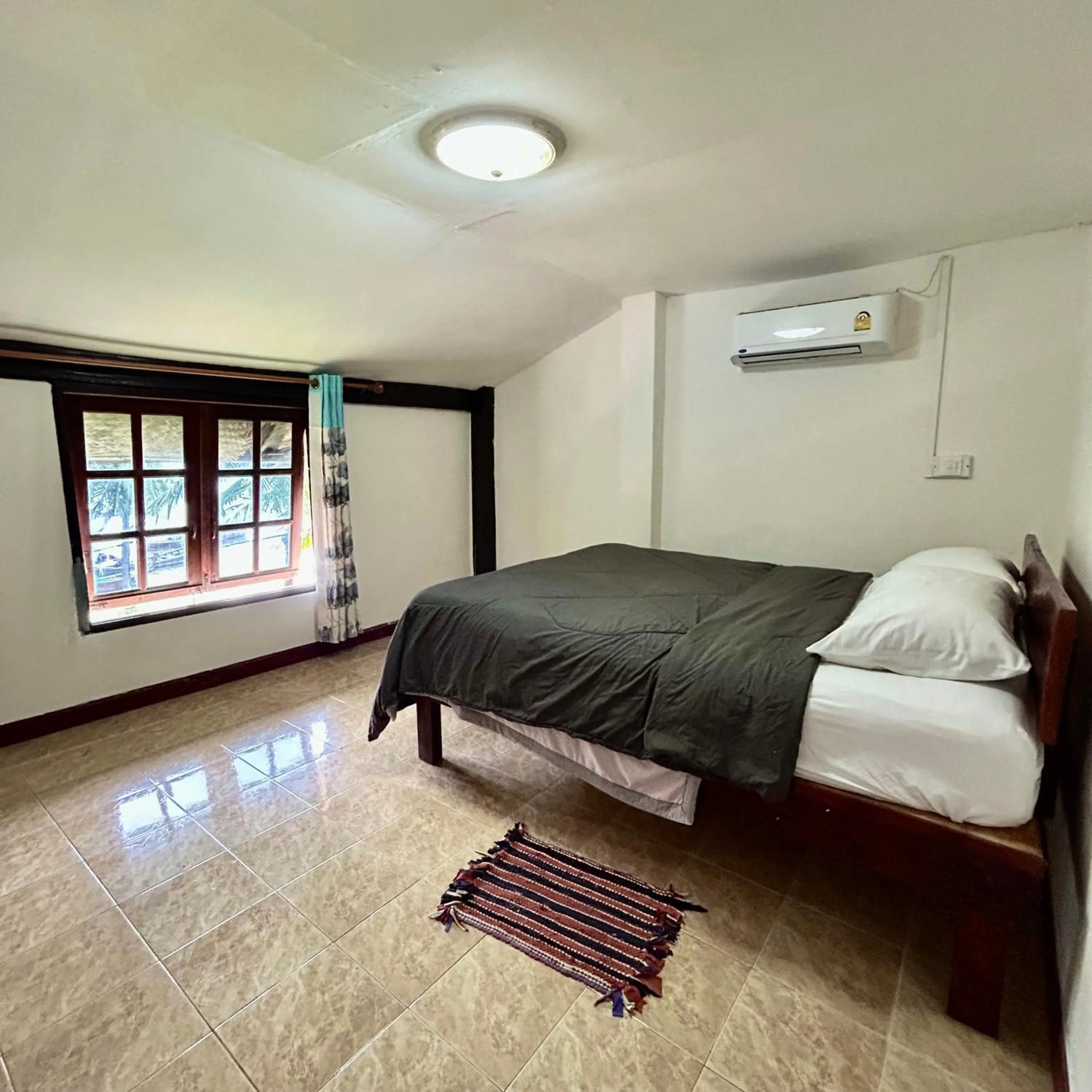 Bed in Lam Sai village hotel Koh Yao Noi