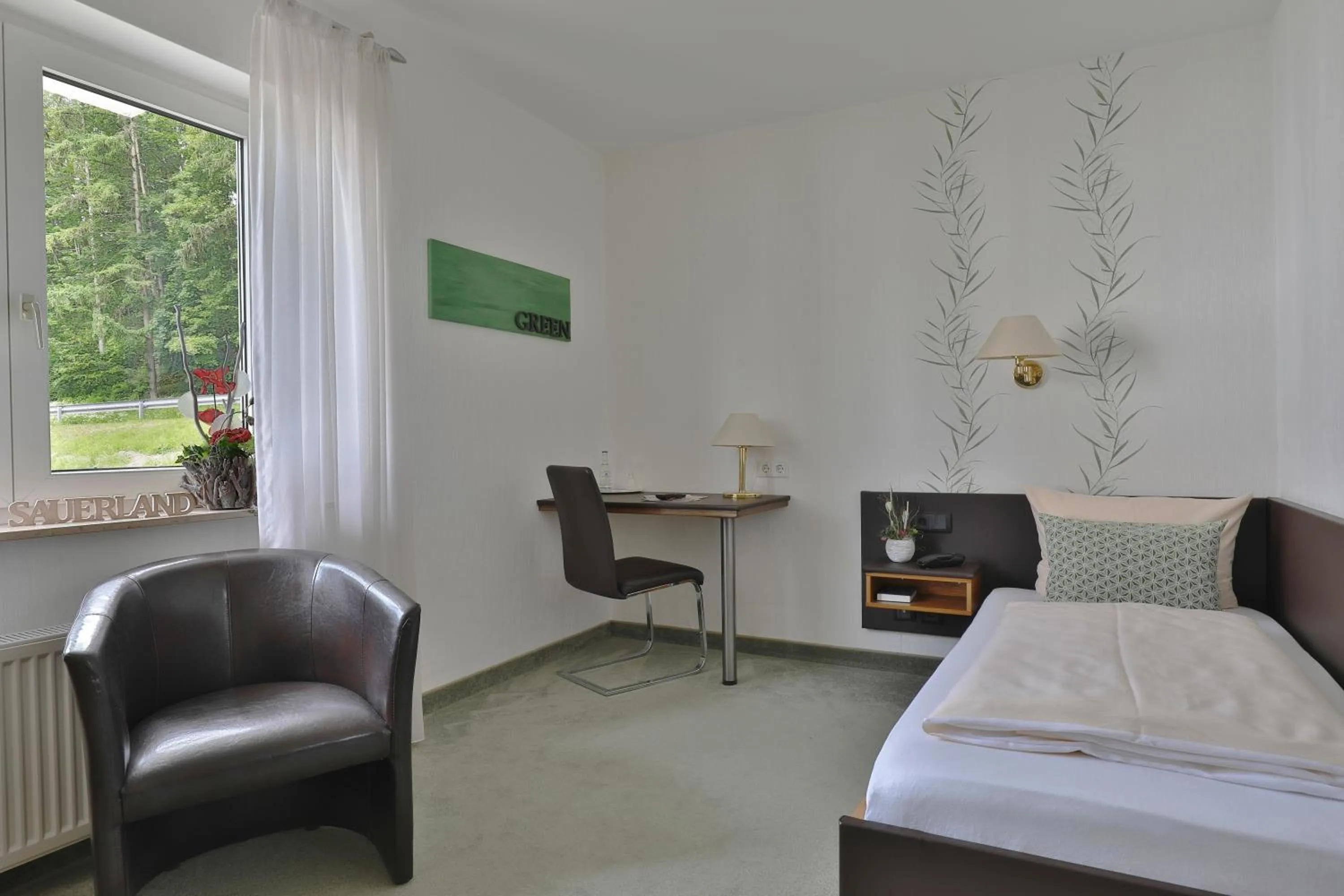 Photo of the whole room, Bed in Luckai Hotel & Restaurant Inhaber Dennis Burmann