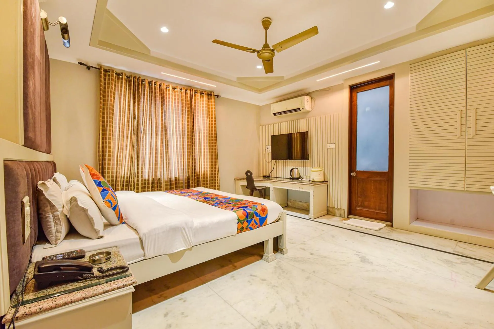 Bed in FabHotel Prem Bihari