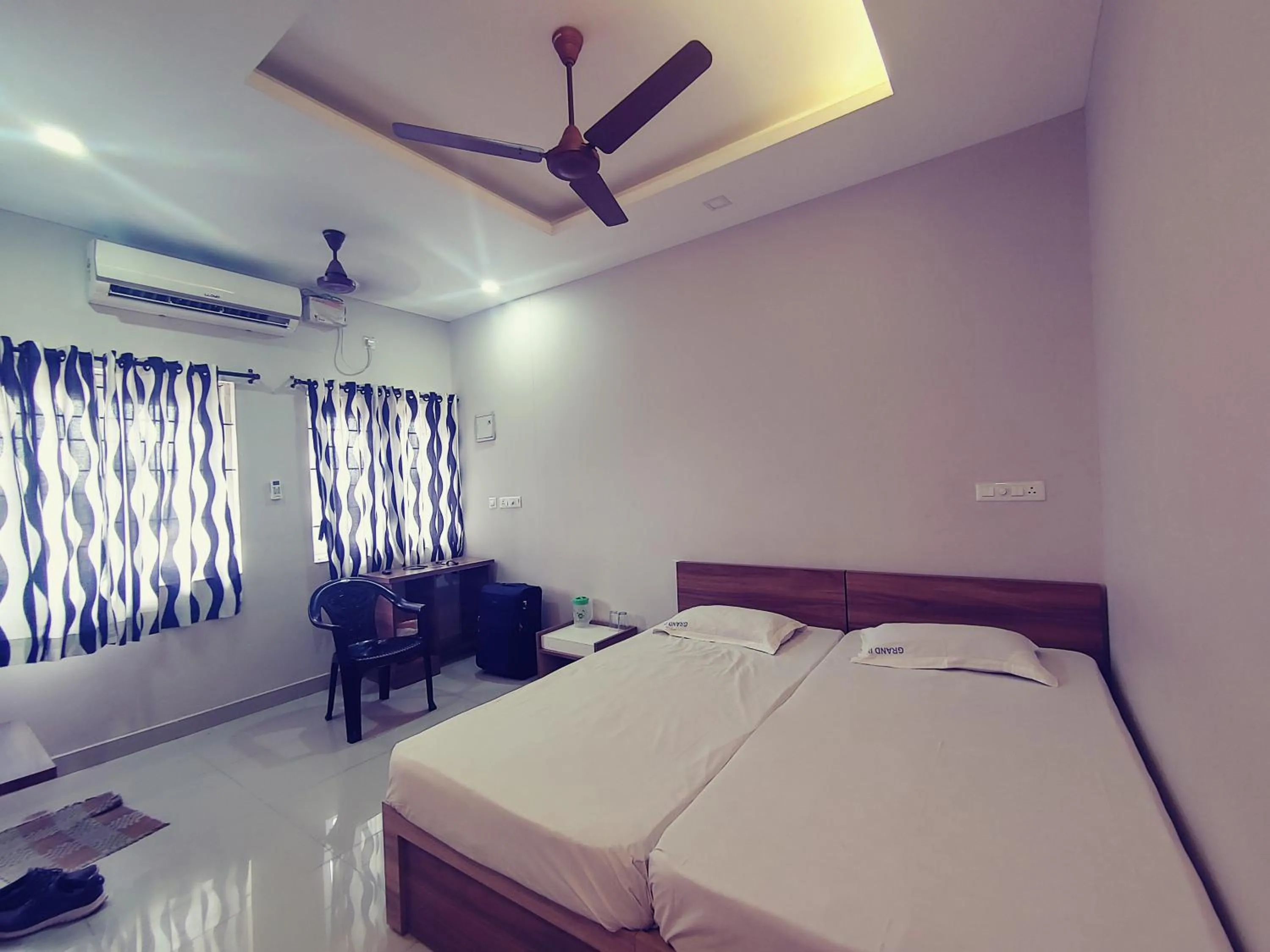 Bed in The Grand Inn