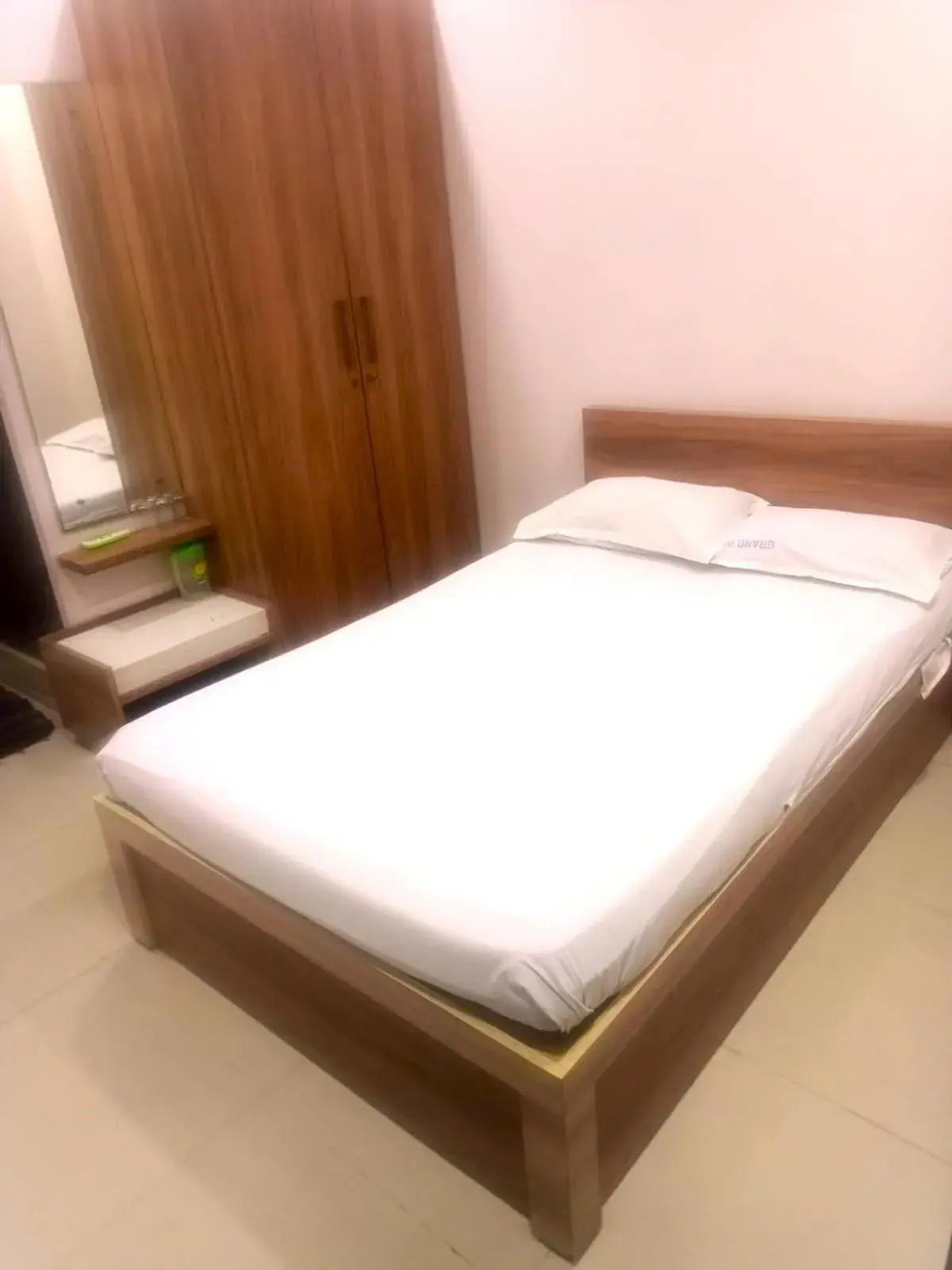 Bed in The Grand Inn Bed in The Grand Inn