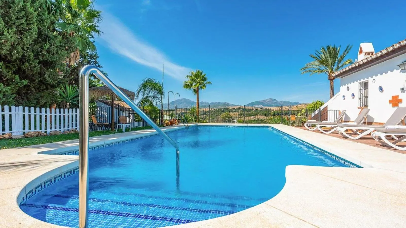 Swimming pool in Casa La Vina del Arenal Pizarra by Ruralidays