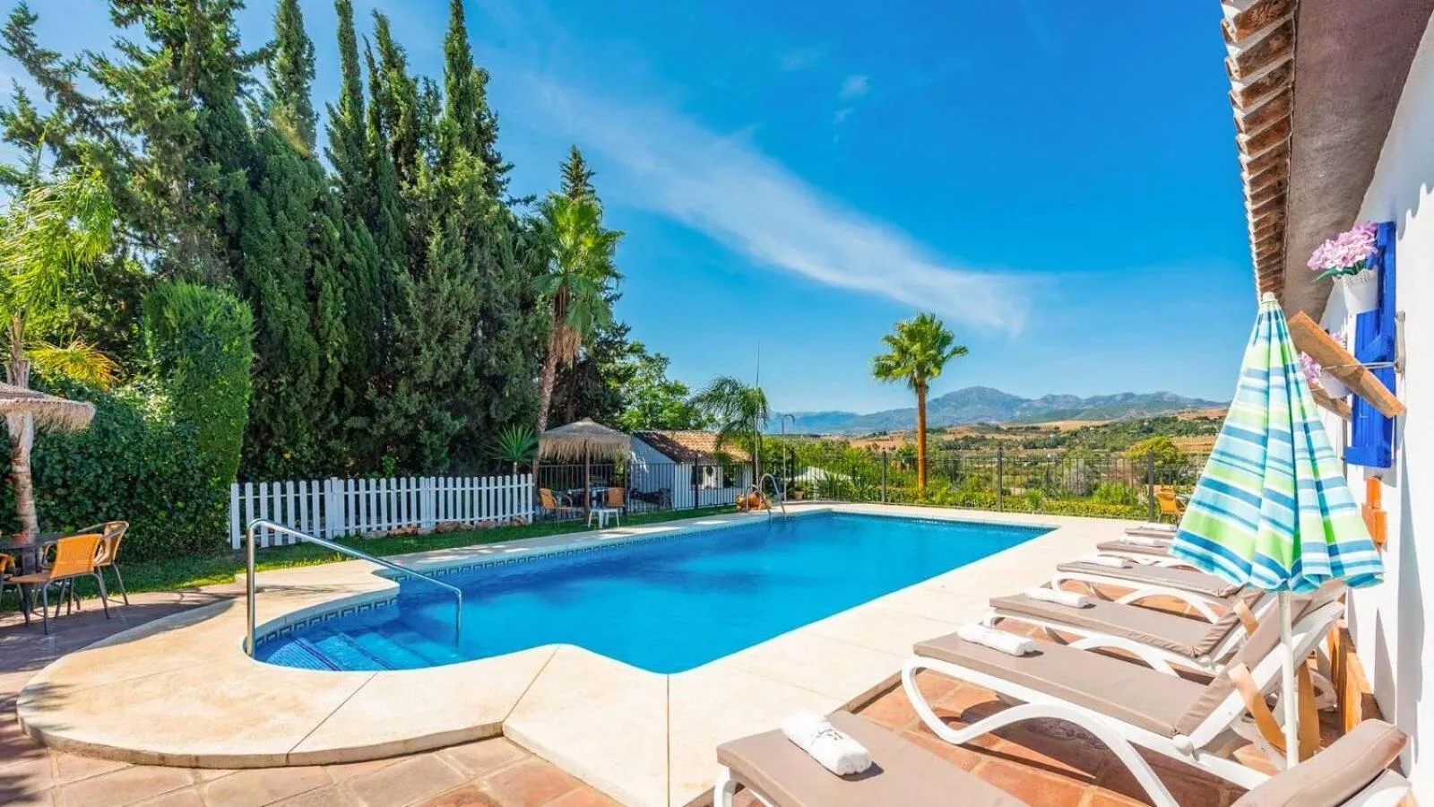 Swimming pool in Casa La Vina del Arenal Pizarra by Ruralidays